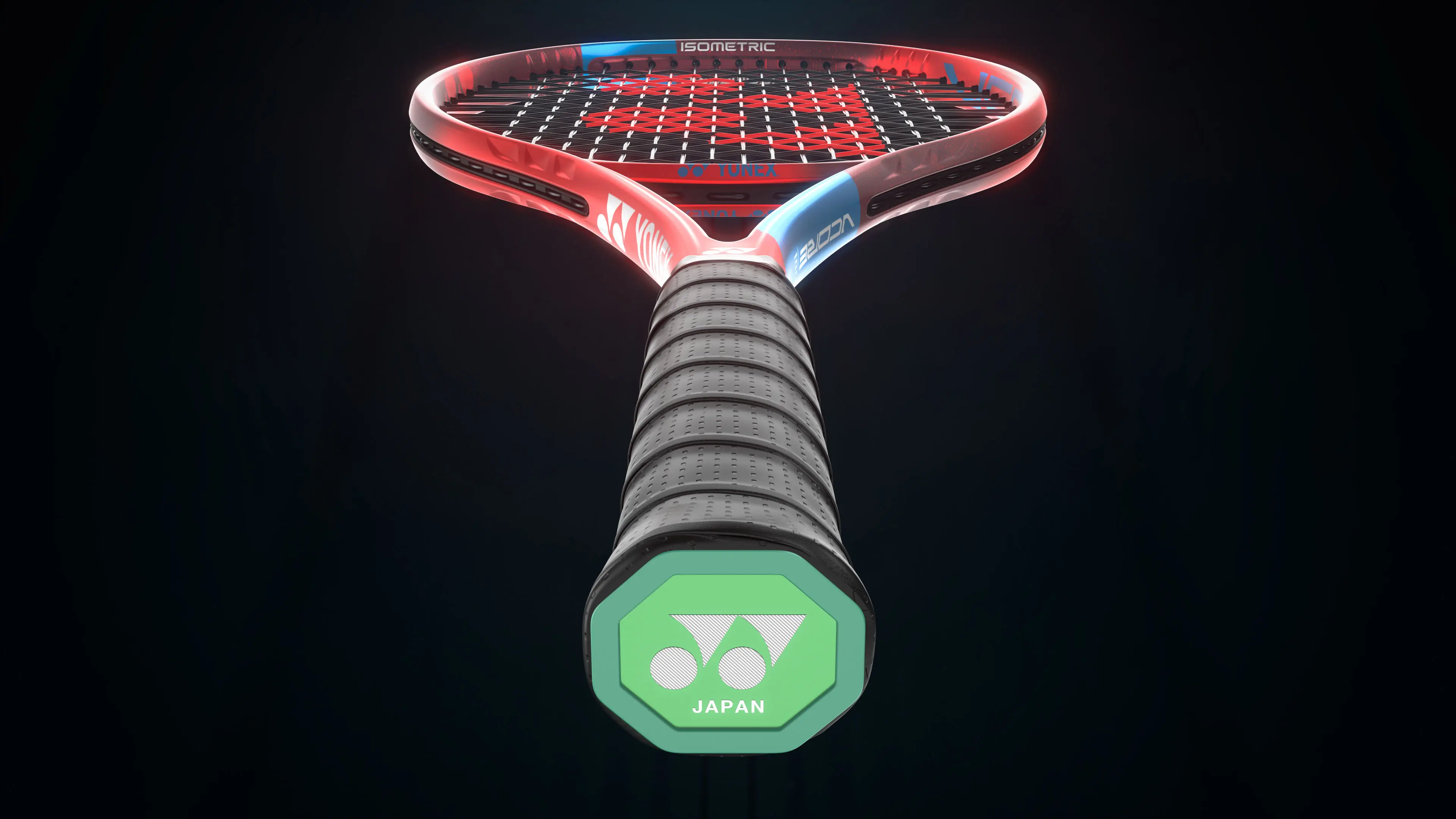 Low-angle 3D product rendering of Yonex VCORE tennis racket handle with green Japan logo and isometric head design