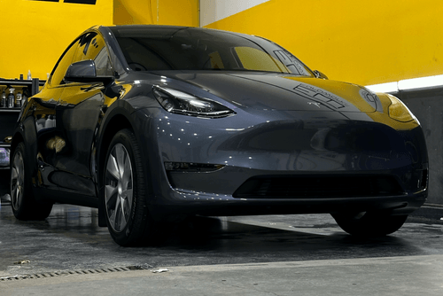 A tesla vehicle that is wrapped in ppf and vinyl