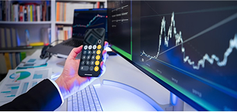 hand and calculator