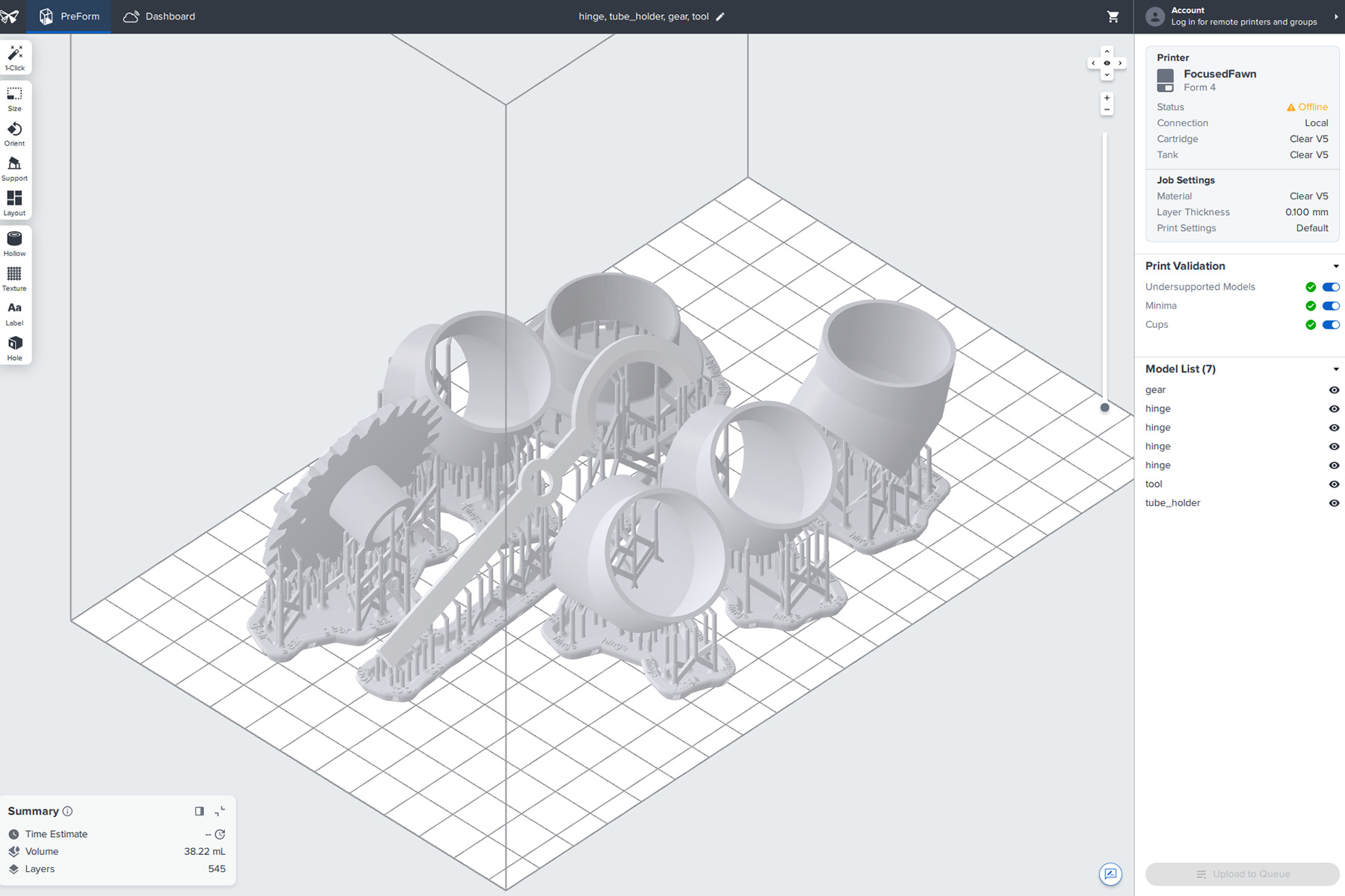 Screenshot of PreForm software for resin 3D printing. Several items such as gears and tubes are arranged on the printbed