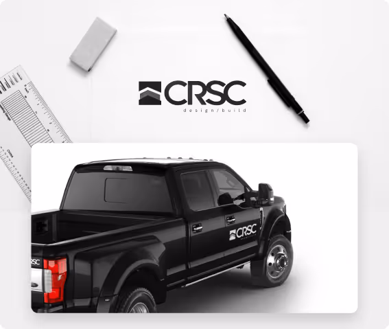 Image showing branding project by Cegrix Ad Agency for "CRSC" logo hand drawn on artboard with inner picture of work truck showing logo on door.