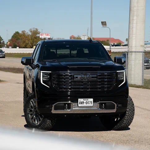 Lifted GMC Sierra Denali, front view, social post