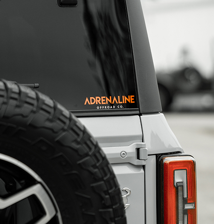 Adrenaline Offroad Co. decal on a Ford Bronco rear window