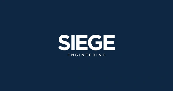 Siege Engineering logo reversed on navy.