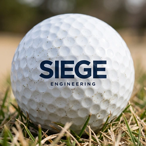 Siege Engineering logo on a golf ball.