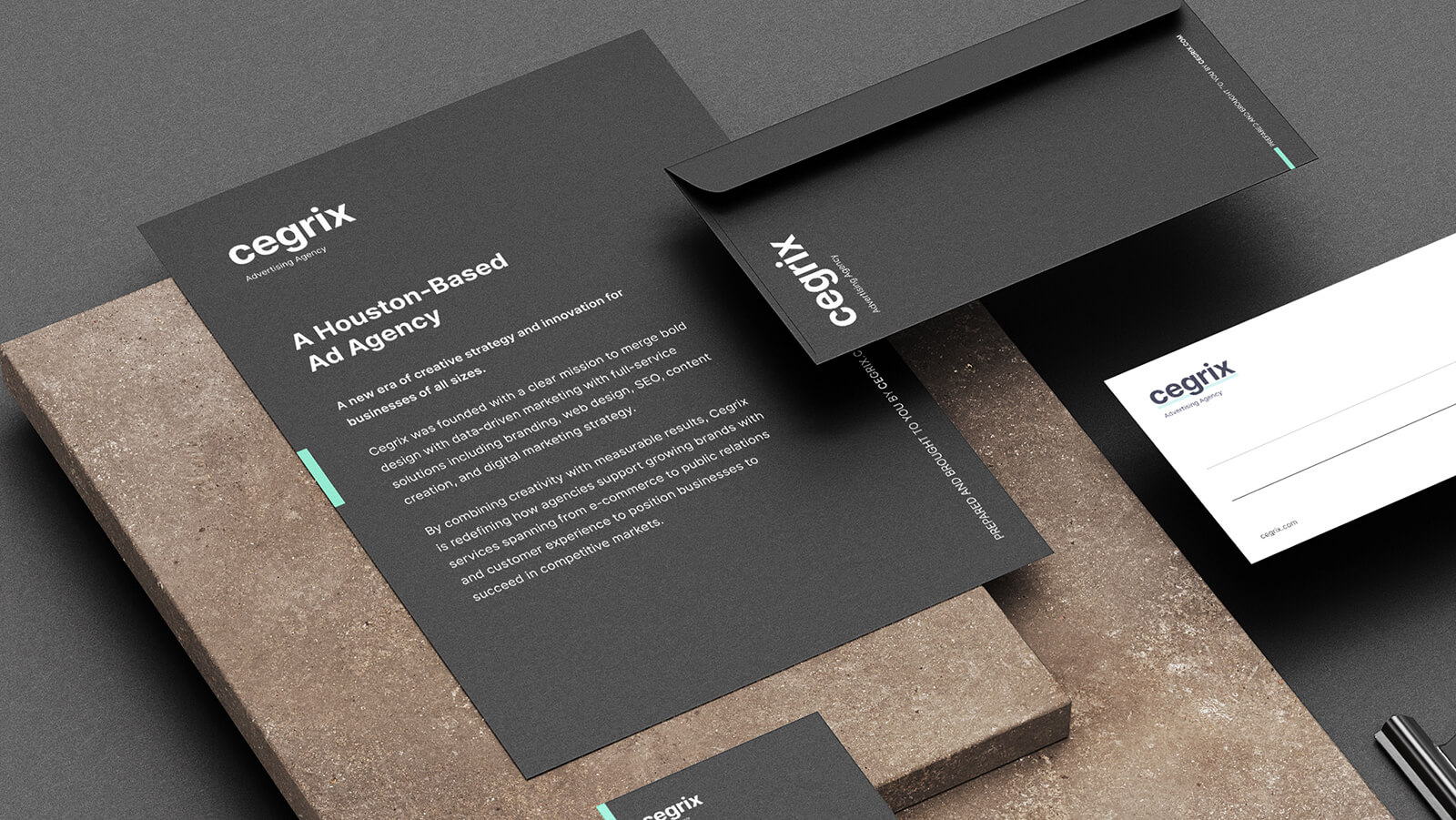 Cegrix Advertising Agency branded stationery set, including a black letterhead, envelope, and white notecard, showcasing modern corporate identity design.