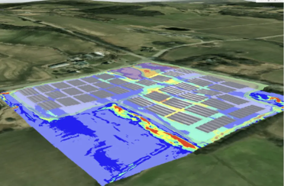Aerial view of a solar farm with color overlays indicating site analysis data, surrounded by open land and fields.