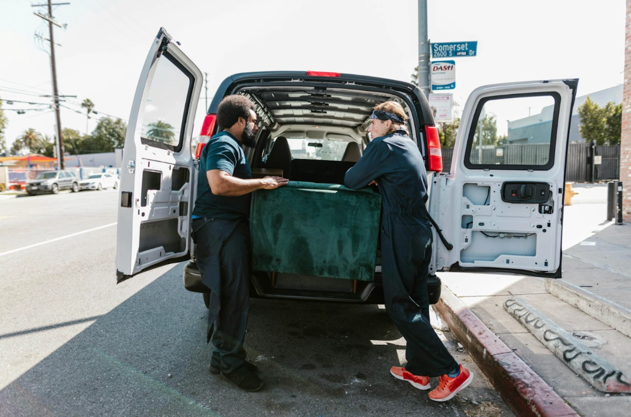 movers putting stuff in van