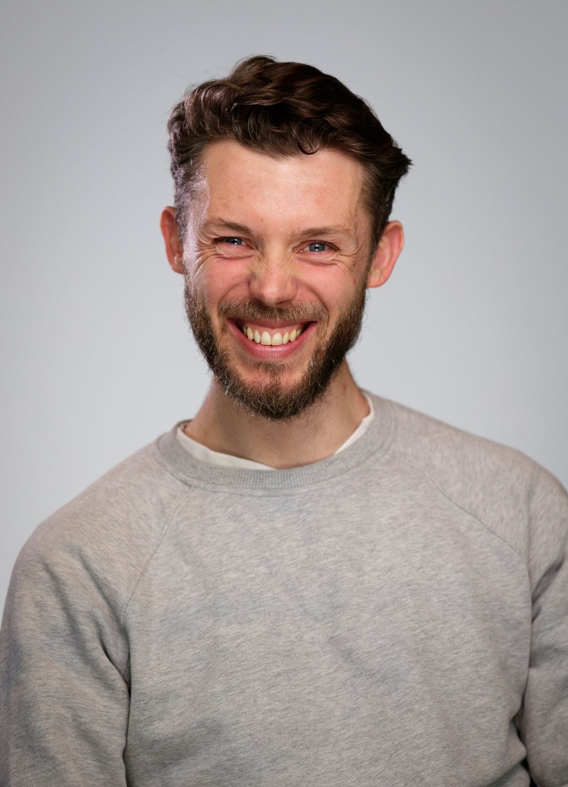 Jon Barnes laughing in the studio
