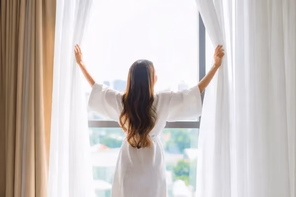 Accessible hotels London woman looking out of window