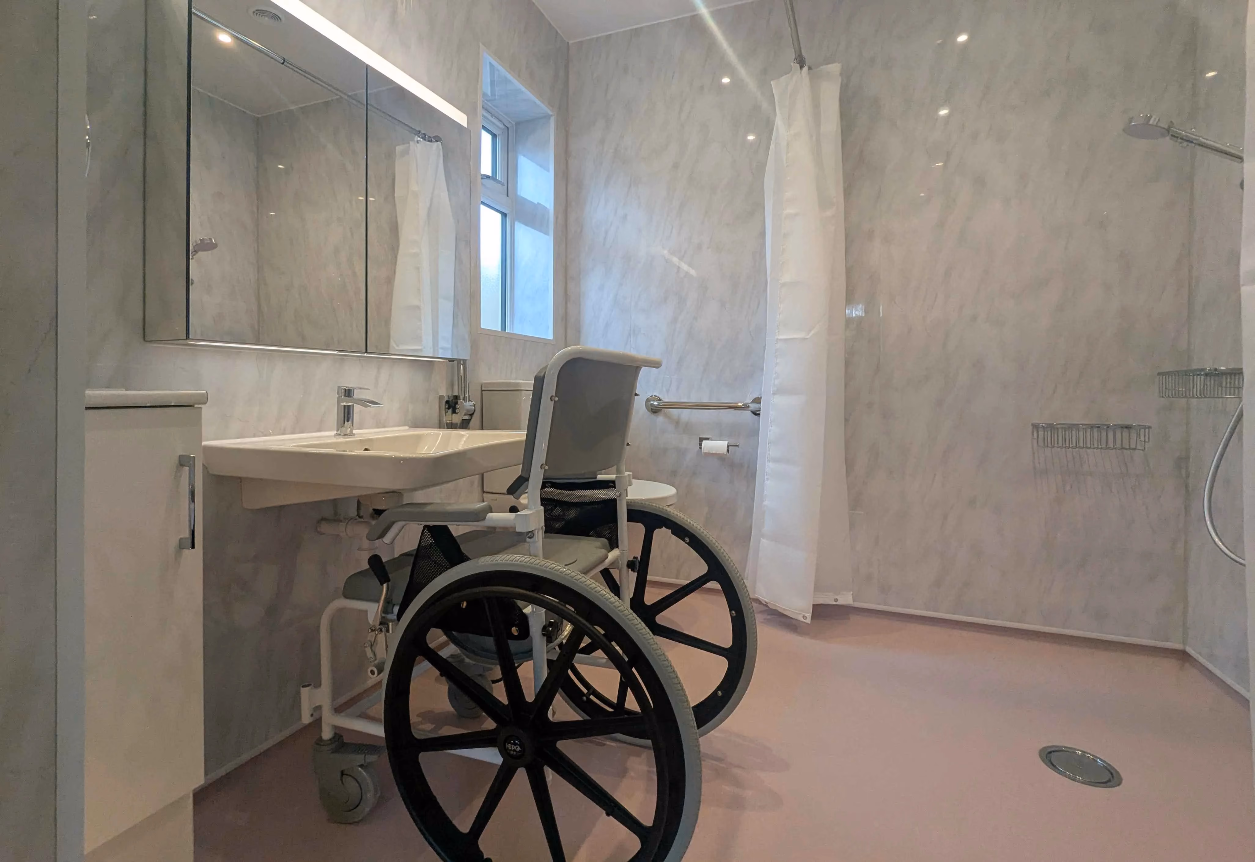 Daily living aids for the elderly and disabled. Mobility wheelchair from Taylor Made Mobility. 