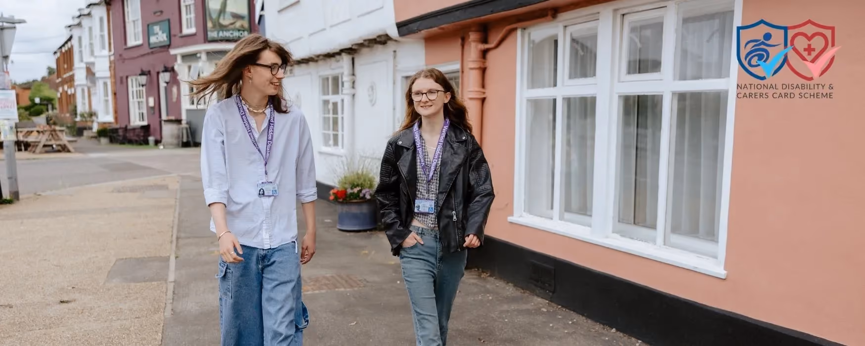 Students walking with National Disability Lanyards