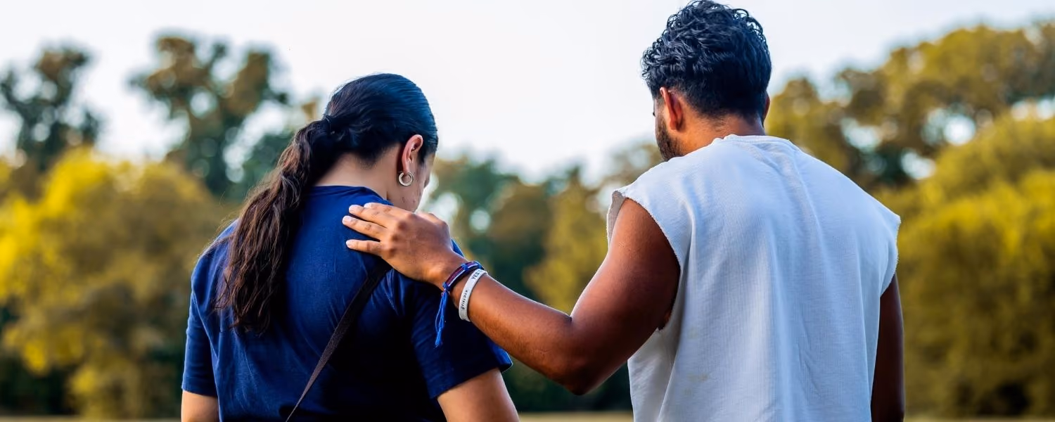 Man and a woman supporting each other