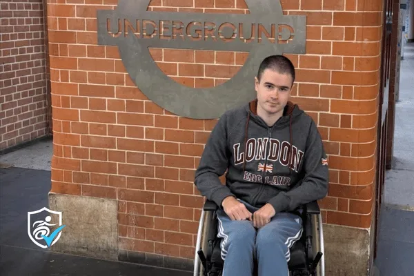 Photo of Liam Virgo outside London Underground sign