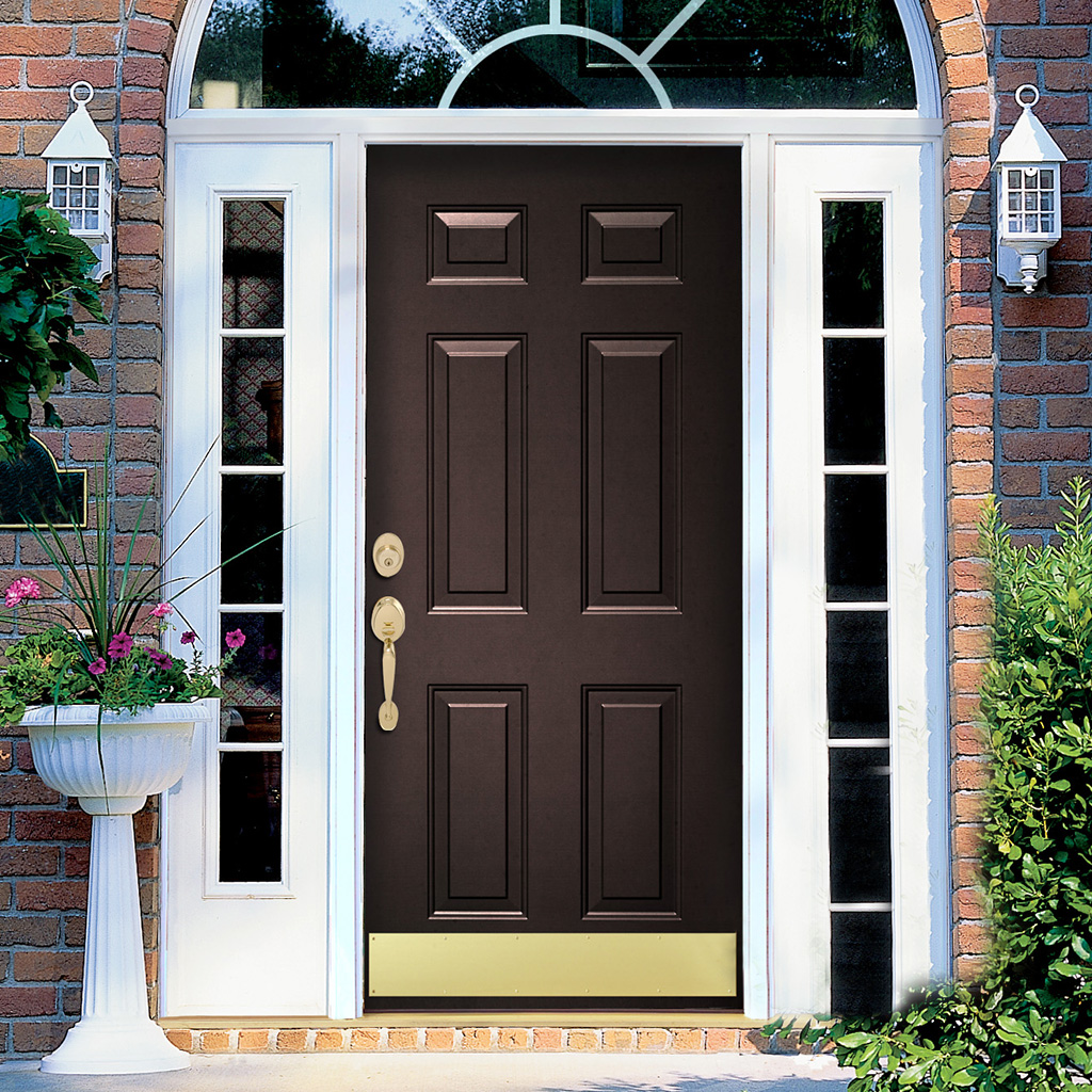 Dark brown exterior door with glass panels and brass hardware for security and style.
