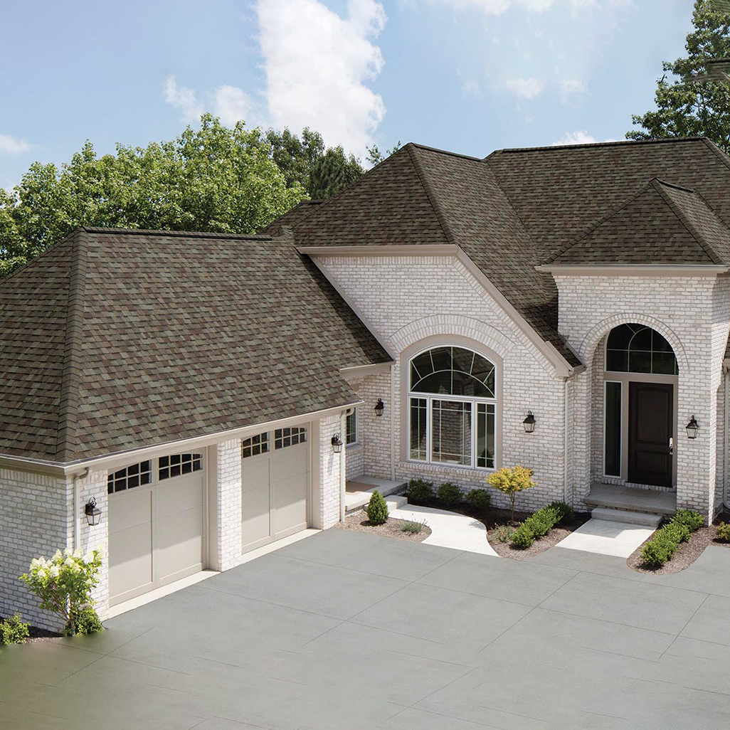 Home with Owens Corning asphalt shingles installed, showcasing Shinnova's premium roofing services.