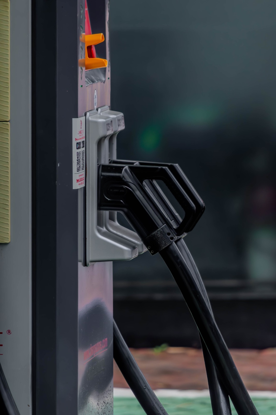 Close-up of ChargeZone EV fast charger connector reliable electric vehicle charging technology in India.