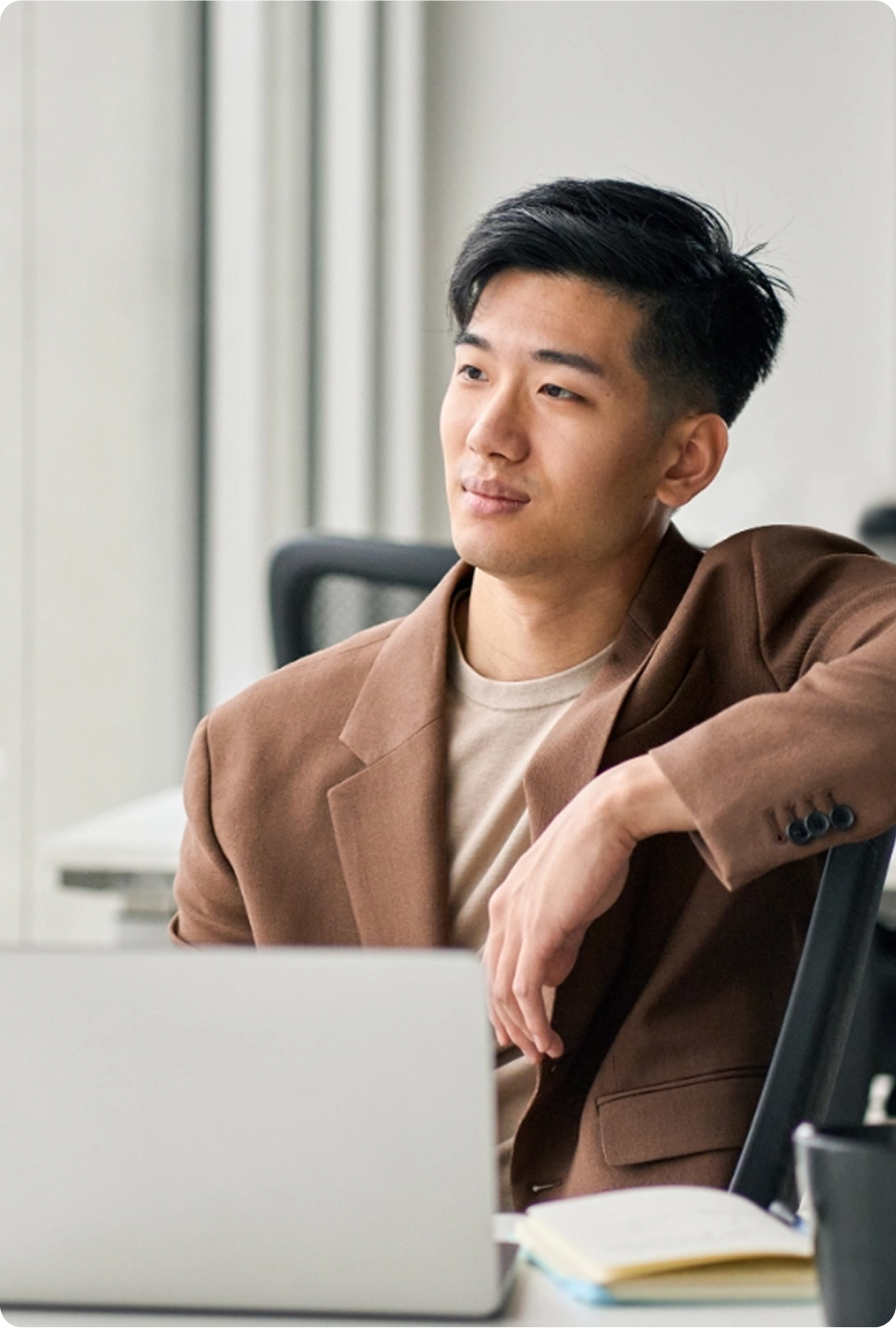 man in front of laptop