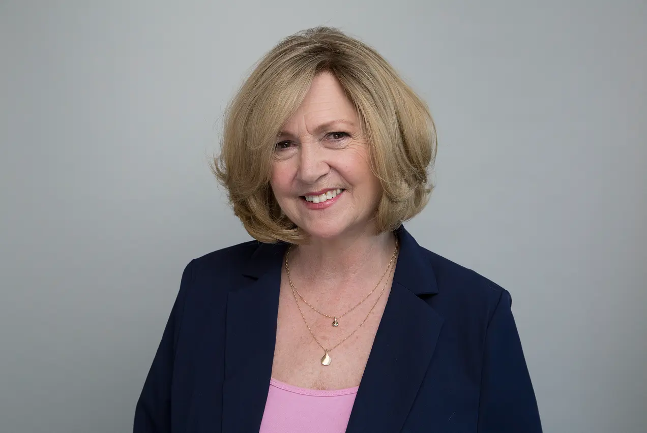 Back view of two men wearing natural-looking wigs for hair loss solutions