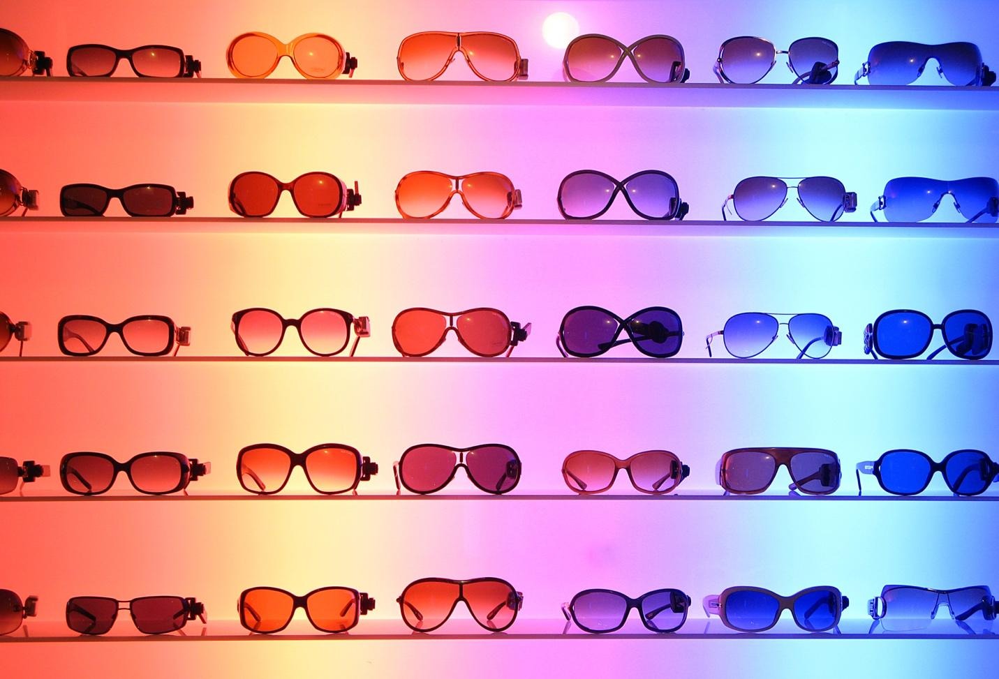 Various sunglasses on shelves