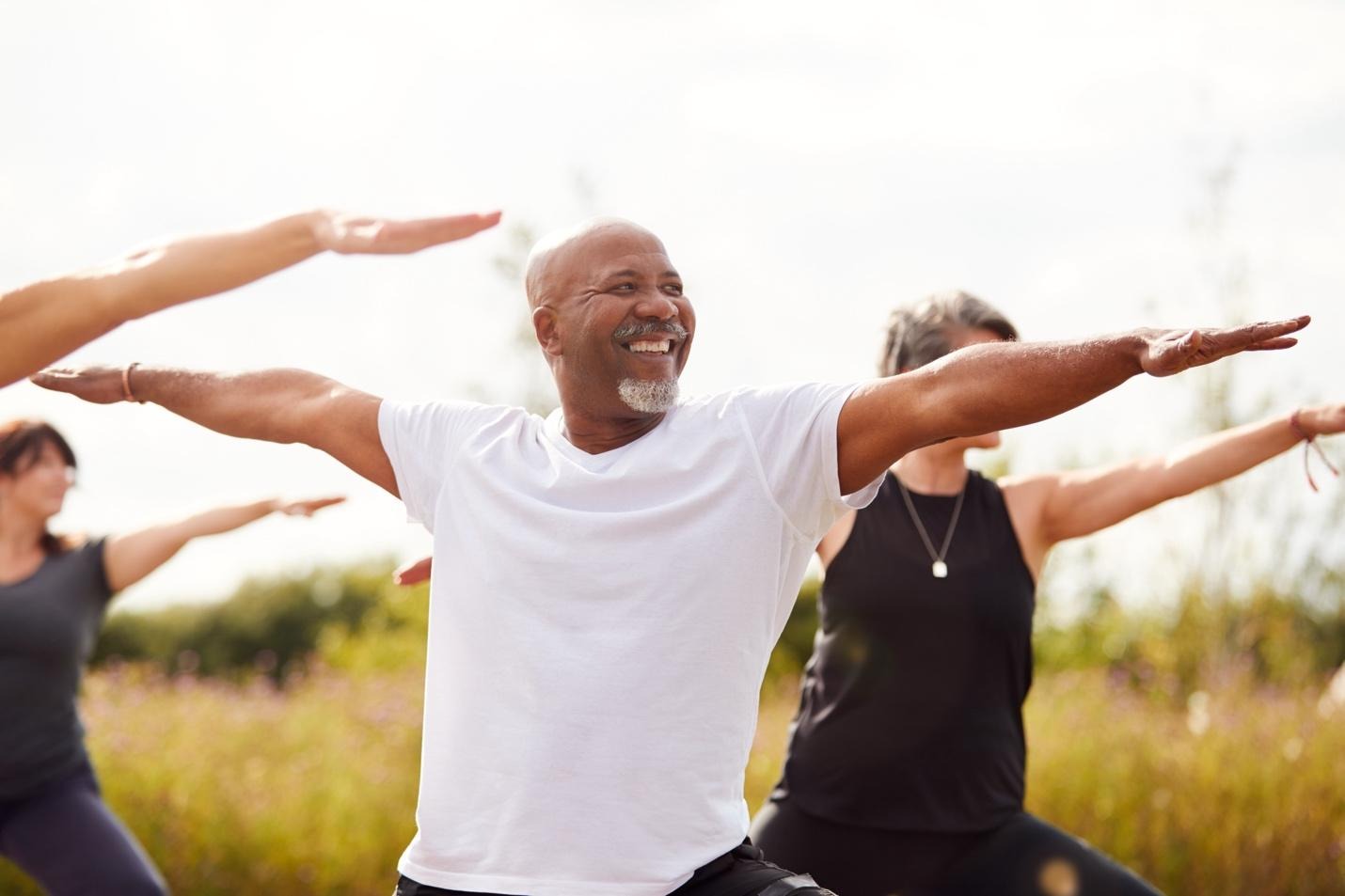 People doing outdoor yoga