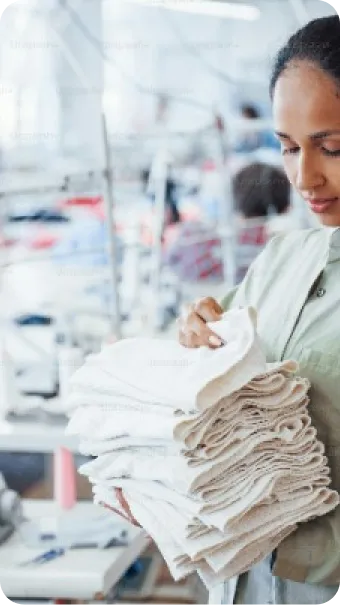 A lady holding Yarn