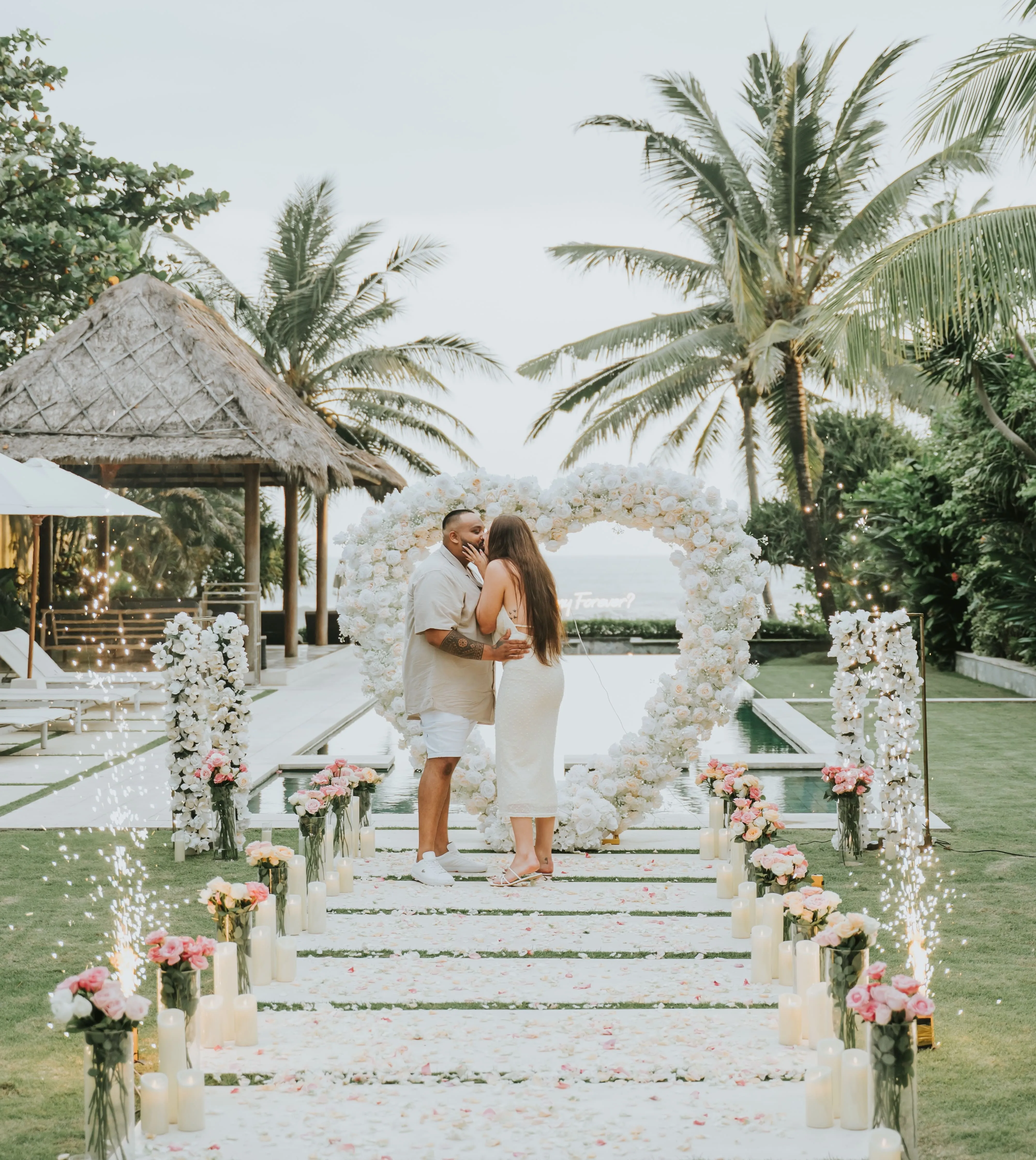 Villa proposal with heart shaped flower arch 