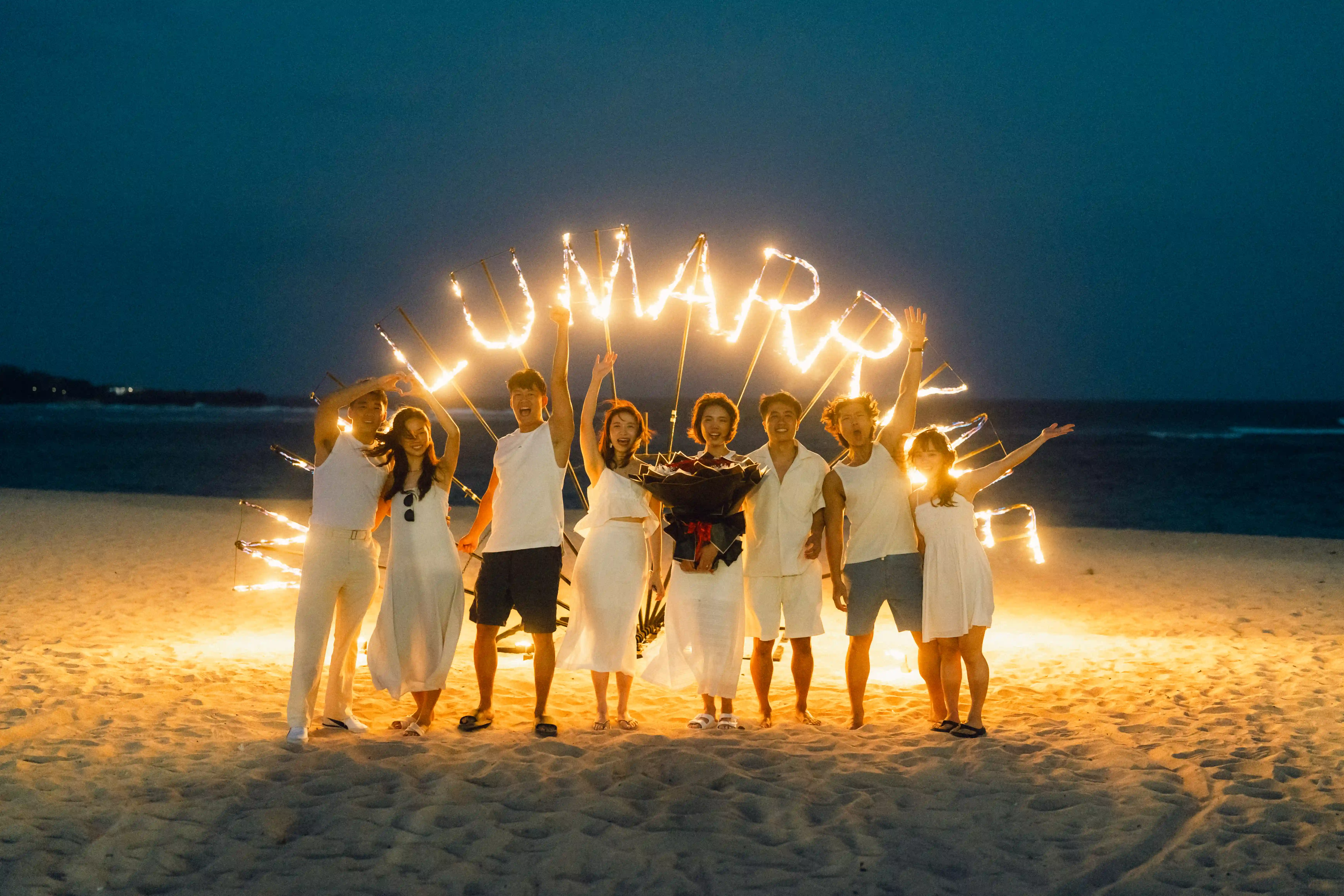 Romantic beach proposal with fire show in Bali