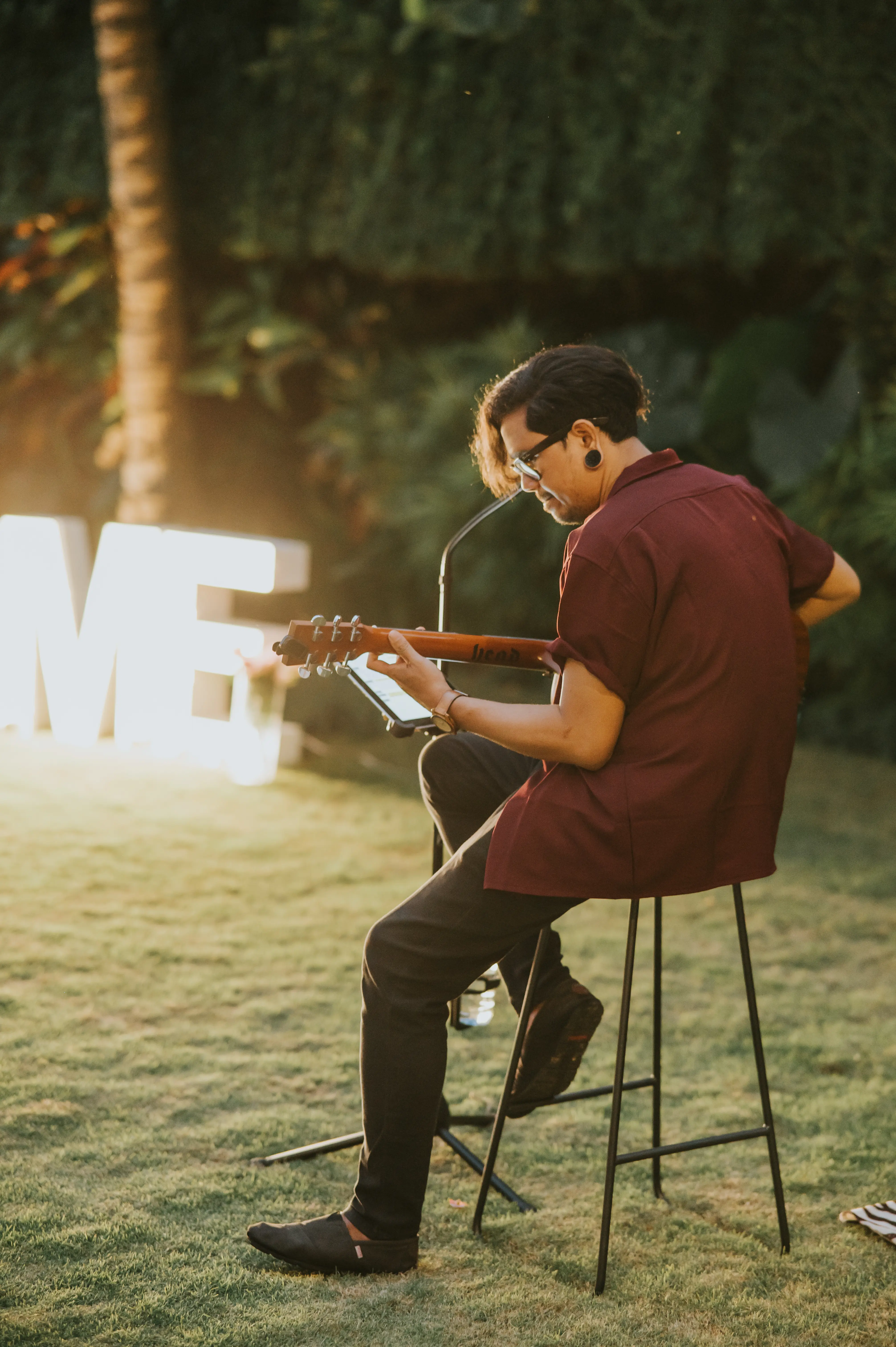 Live guitarist performing during private proposal event in Bali
