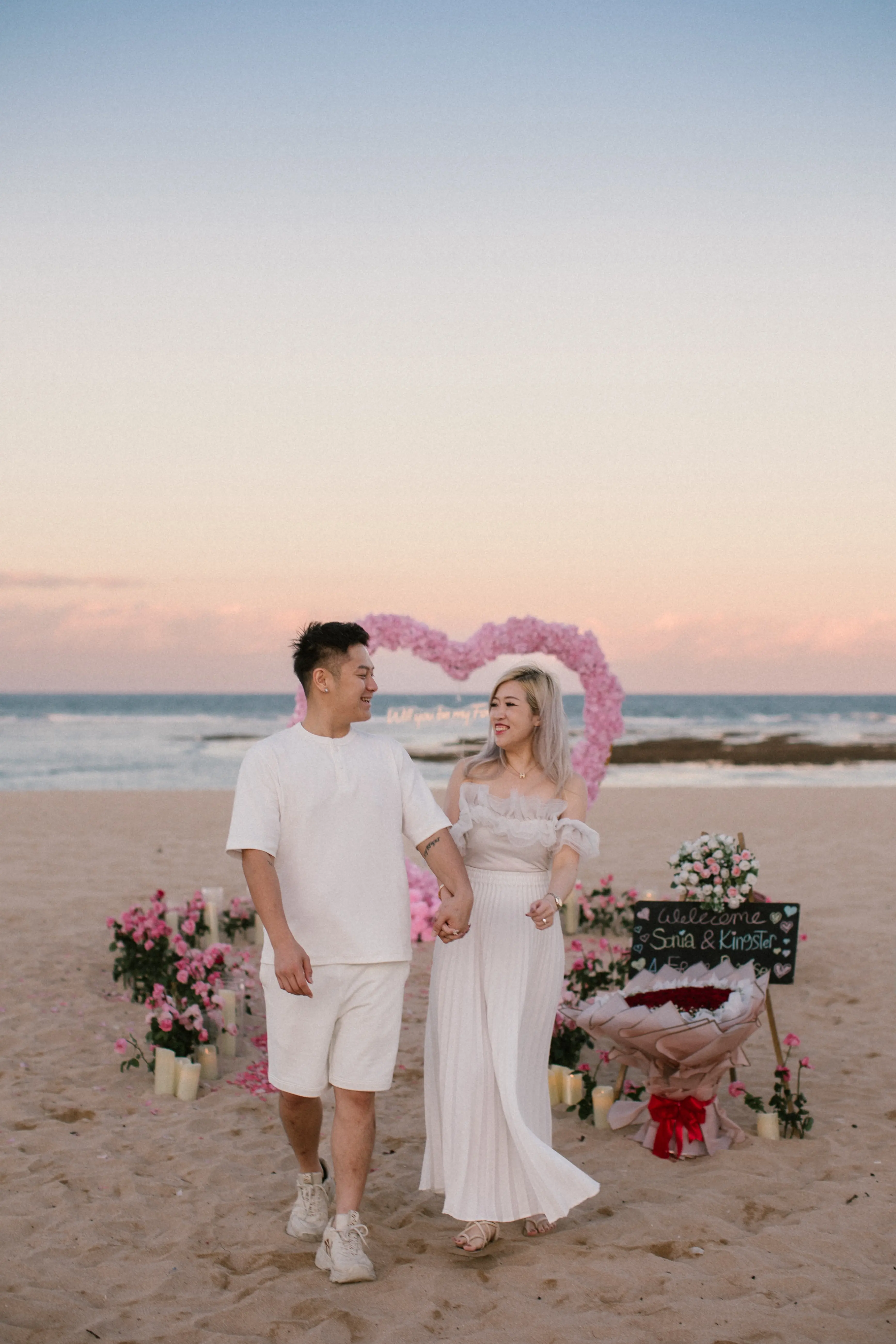 Romantic sunset proposal at the beach in Bali 