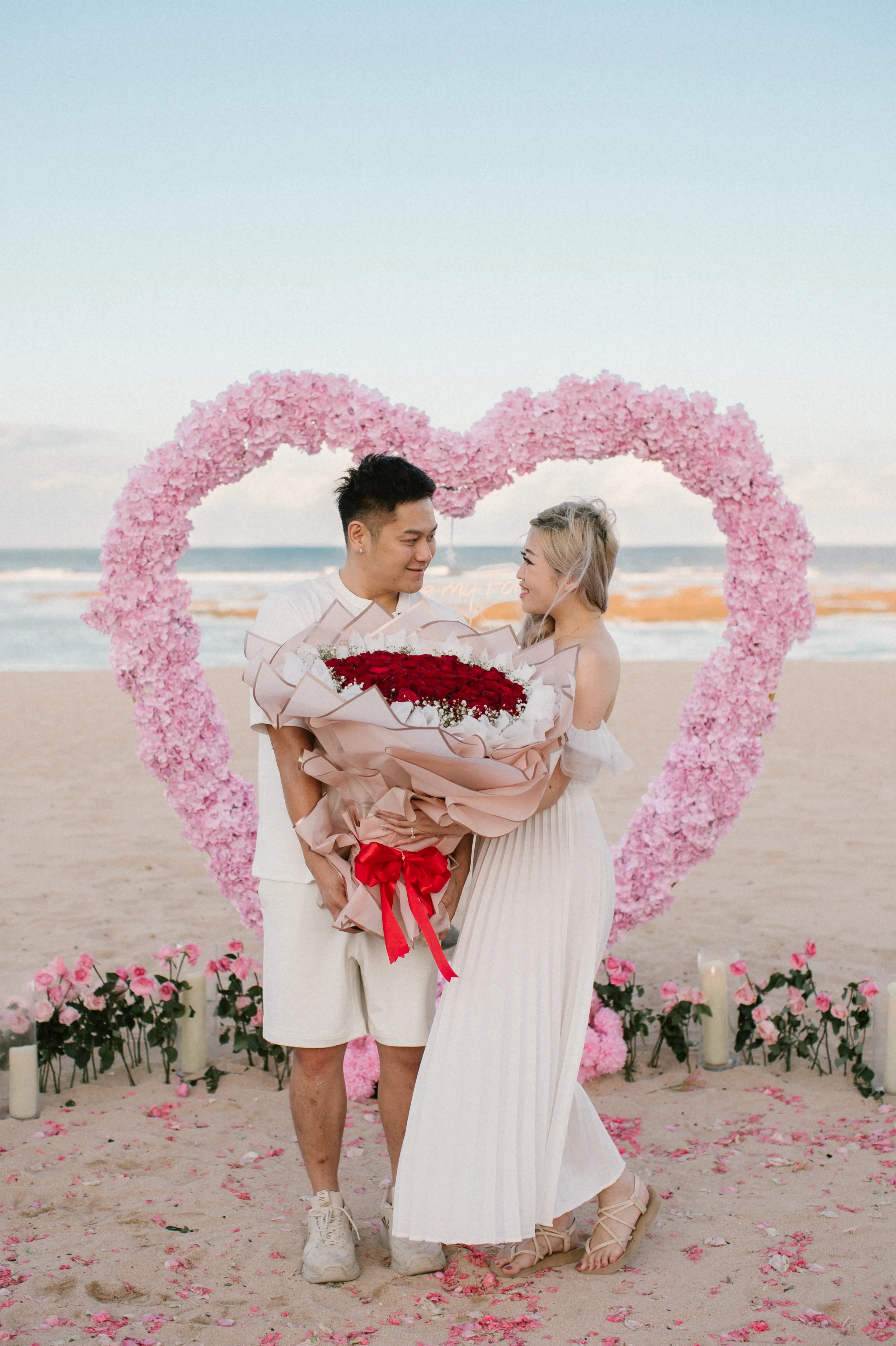 Couple engagement photoshoot at sunset in Bali after proposal