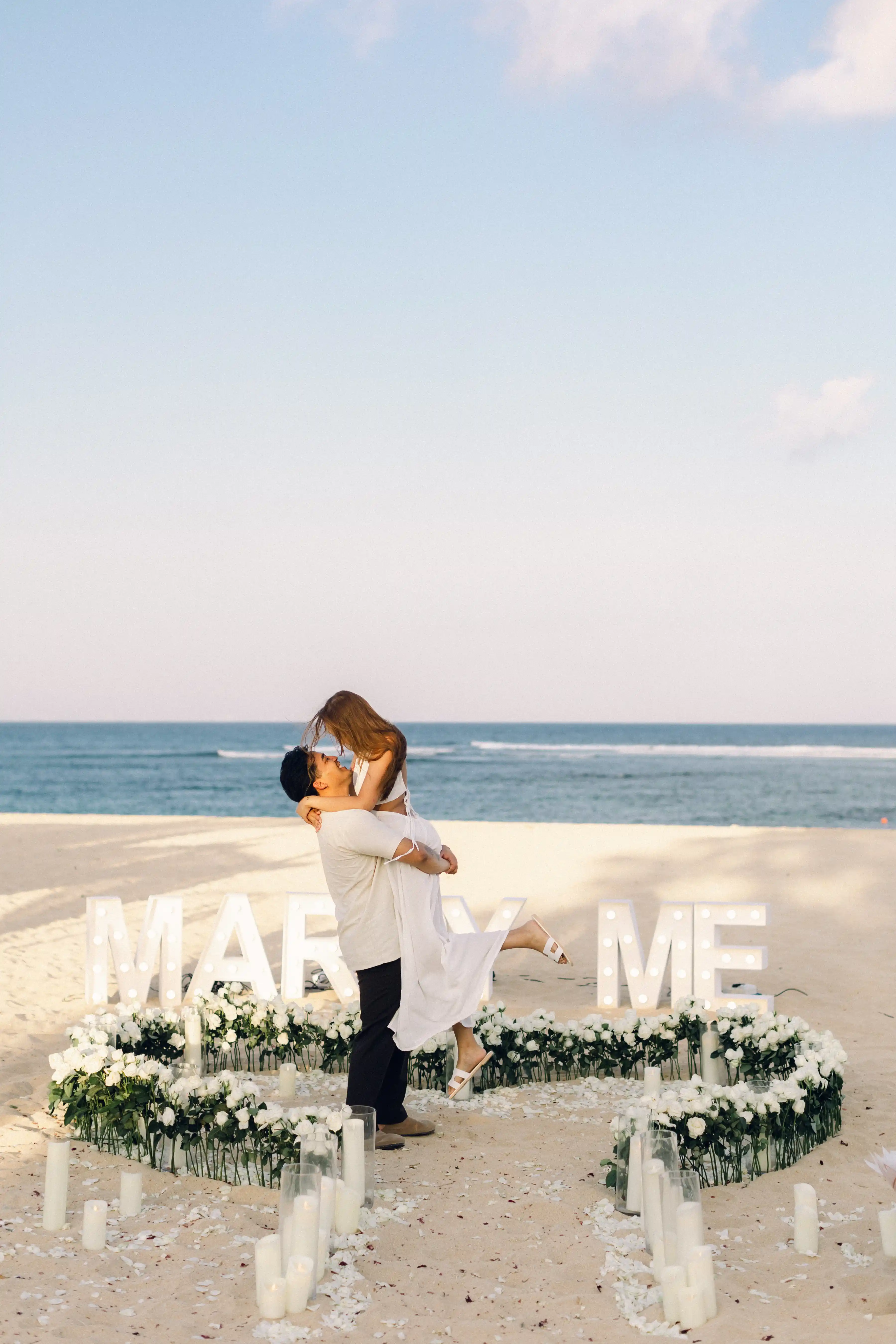 Couple marriage proposal moment on Bali beach