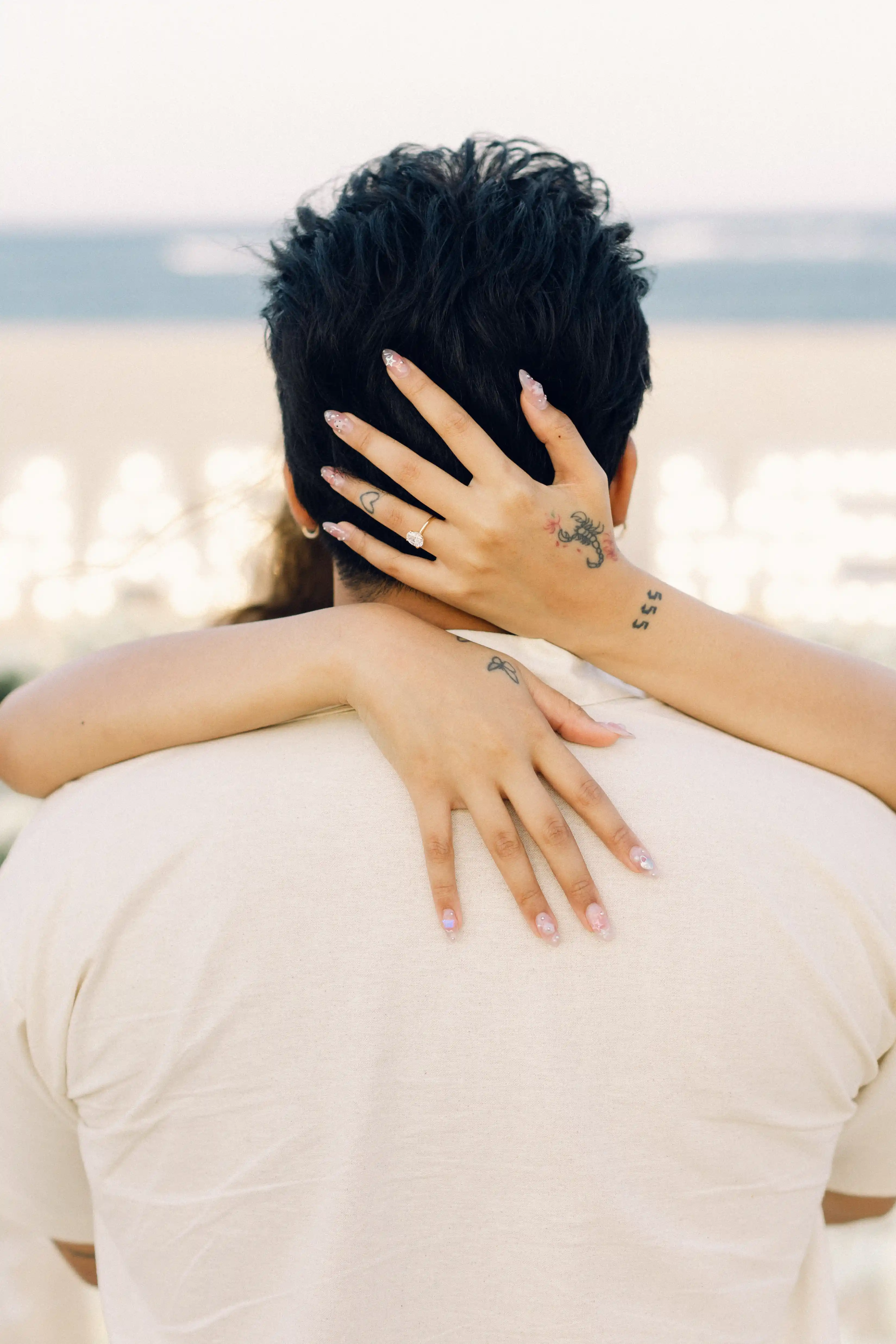 Happy couple hugging after Bali proposal