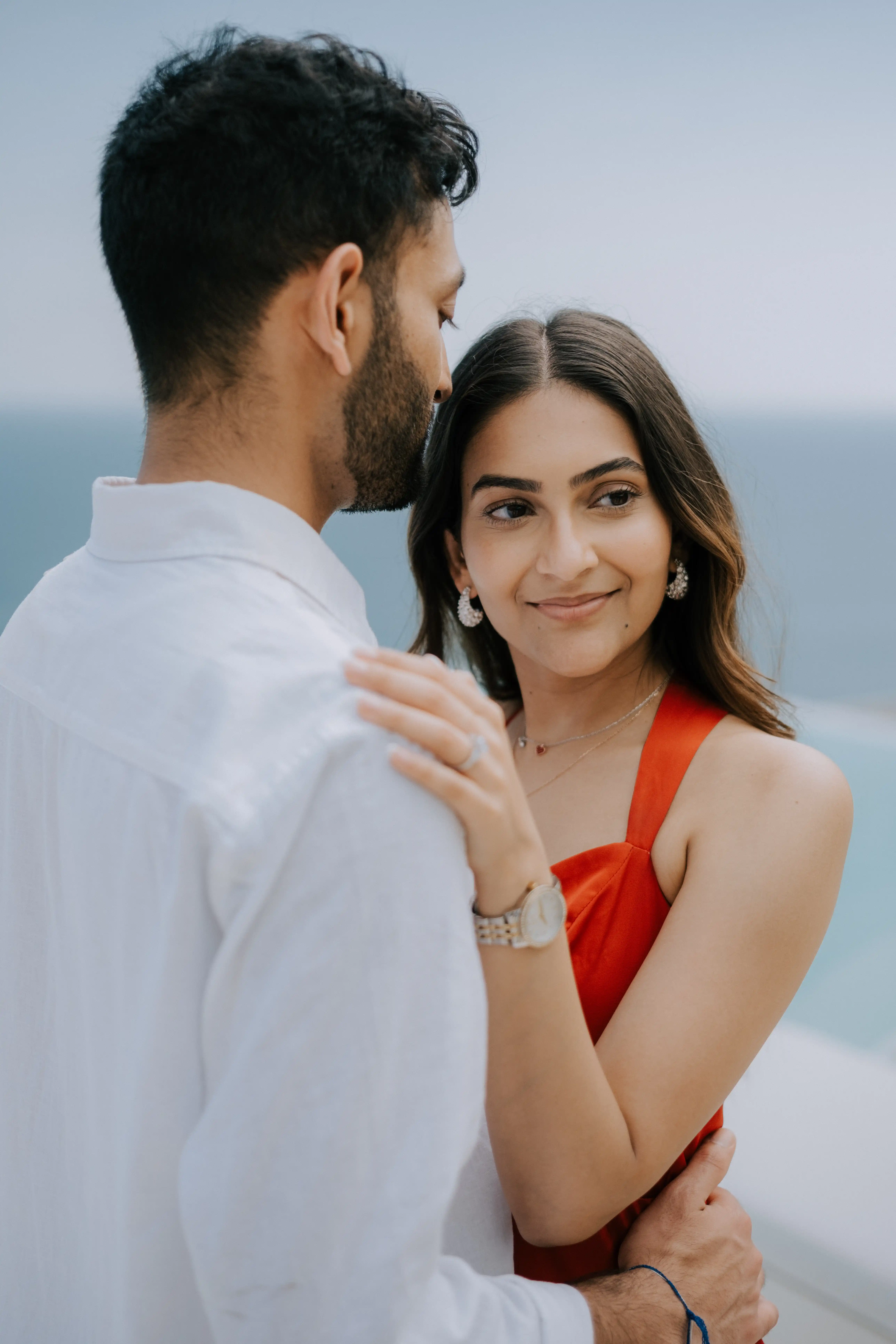 Emotional engagement moment in Bali captured by the ocean.