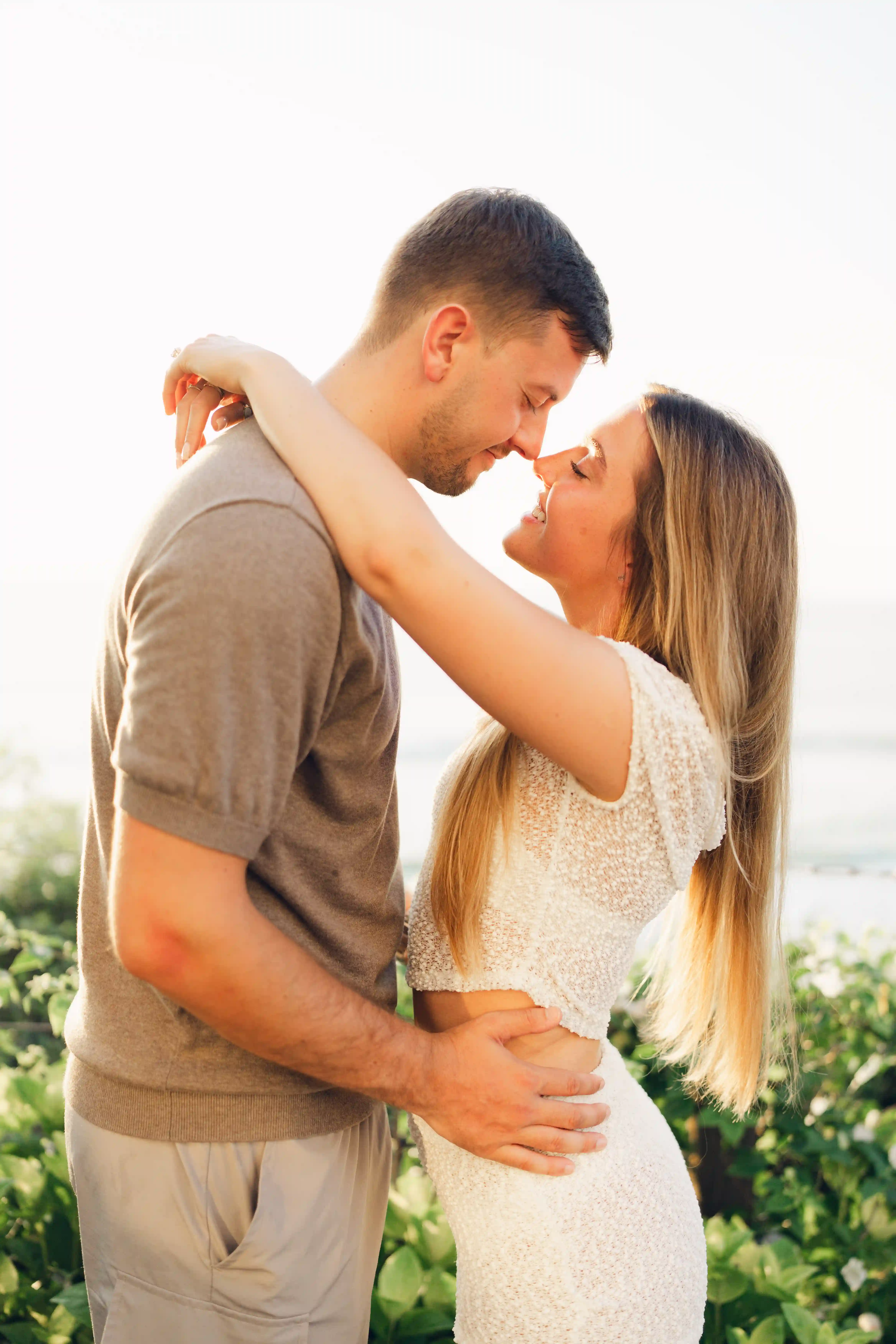 Happy couple just engaged in Bali after romantic proposal.