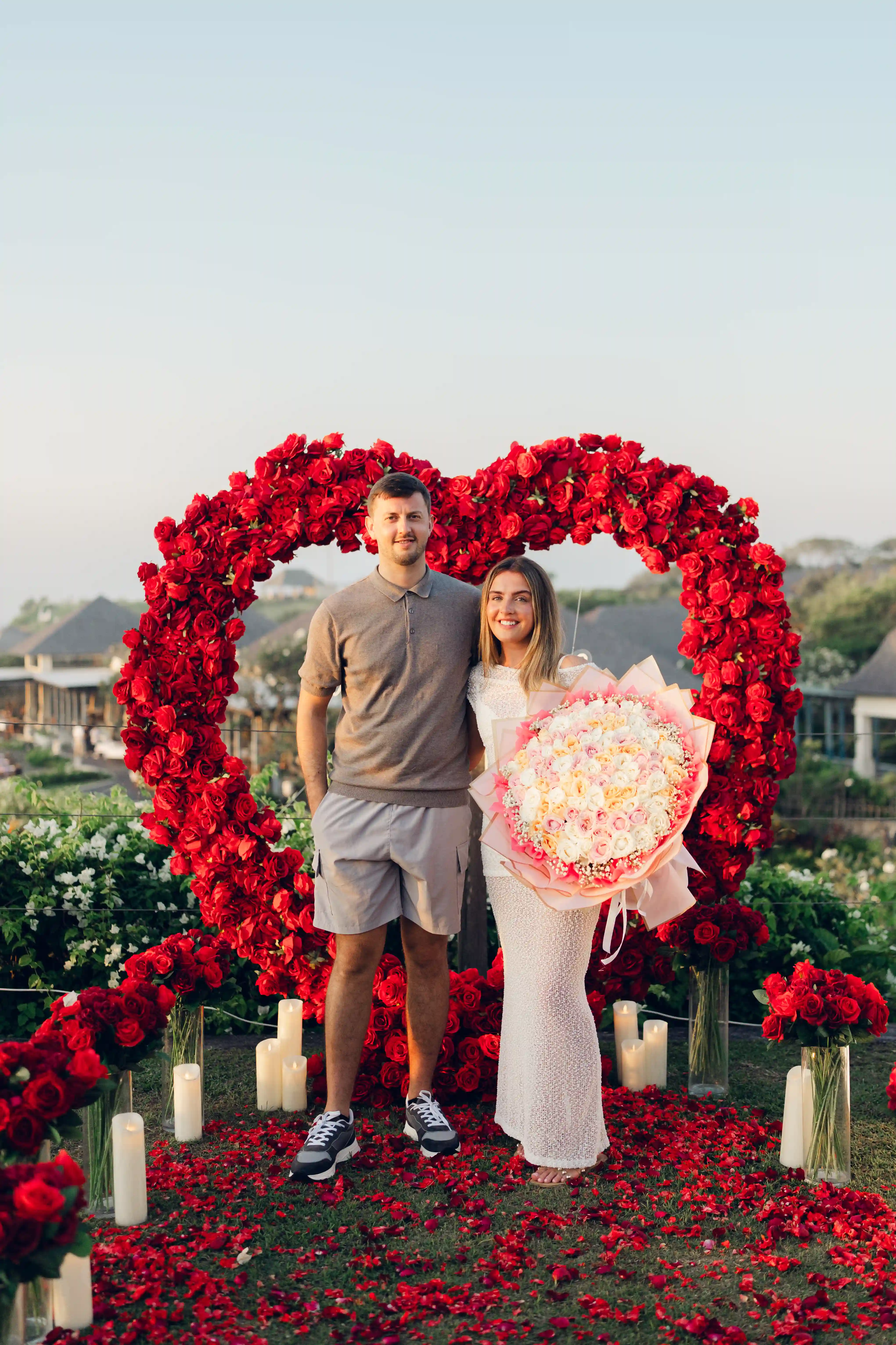 Romantic marriage proposal setup in Bali with red rose heart.
