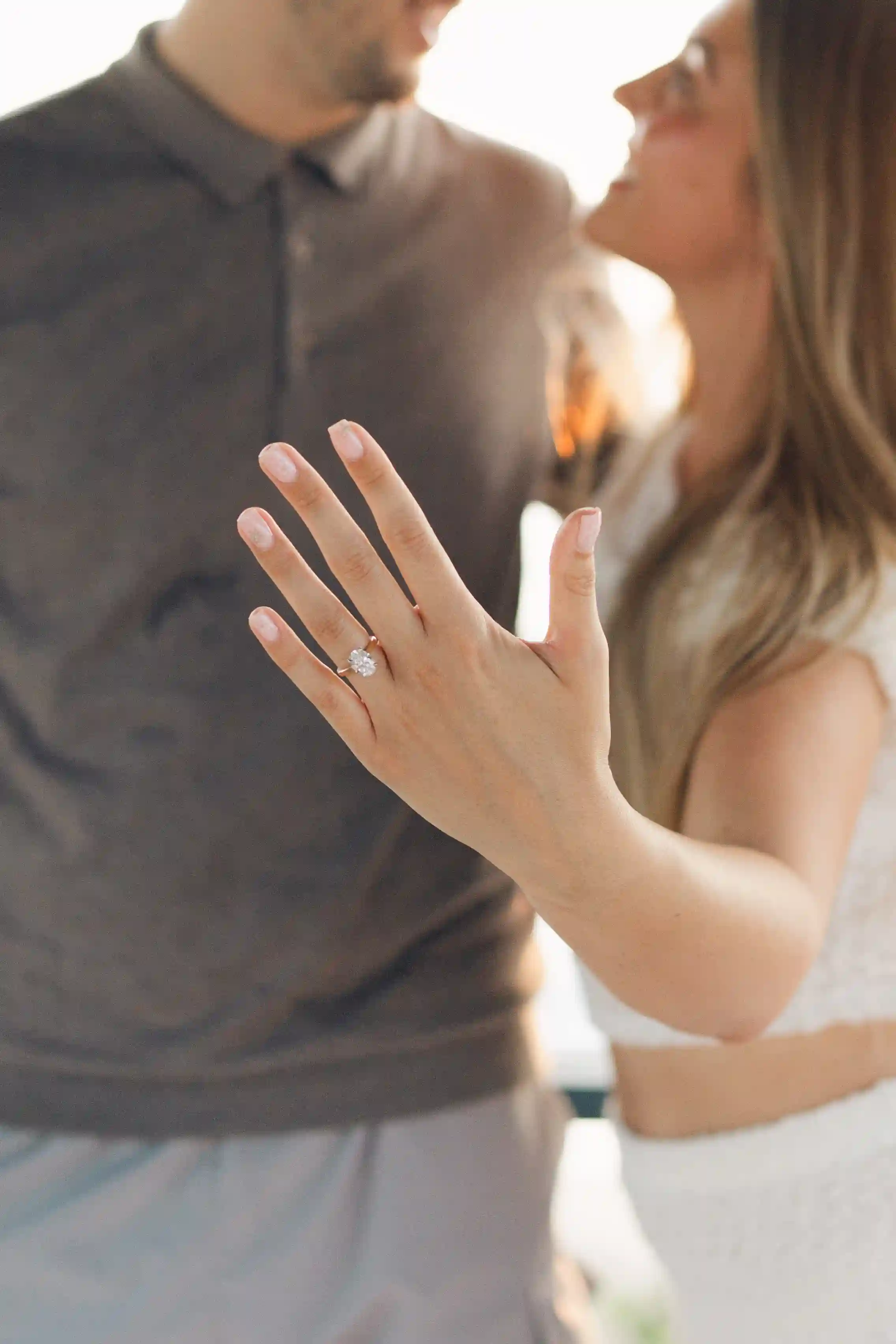 Engagement in Bali – emotional moment of putting on the ring.