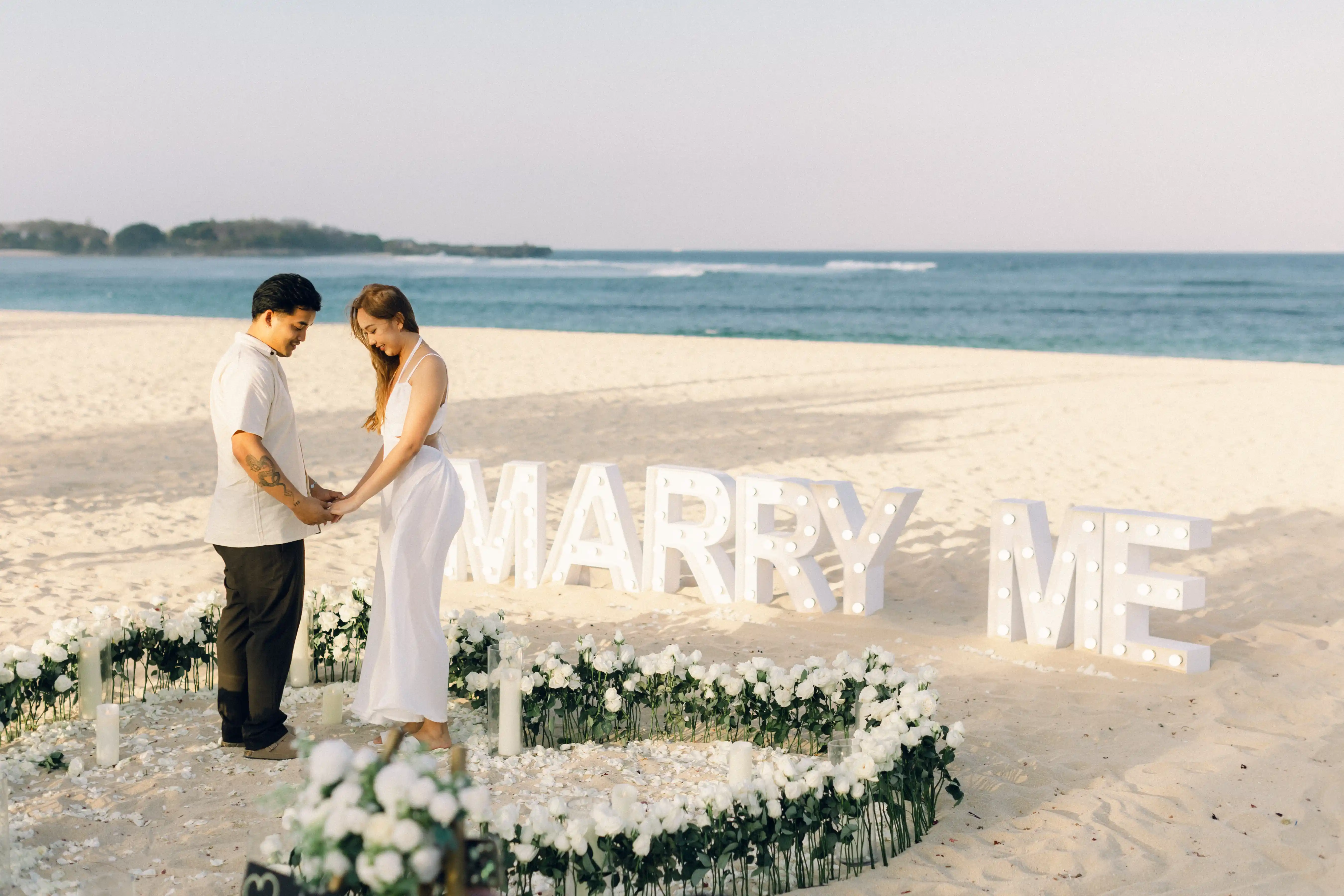 Luxury beach proposal in Bali with romantic setup