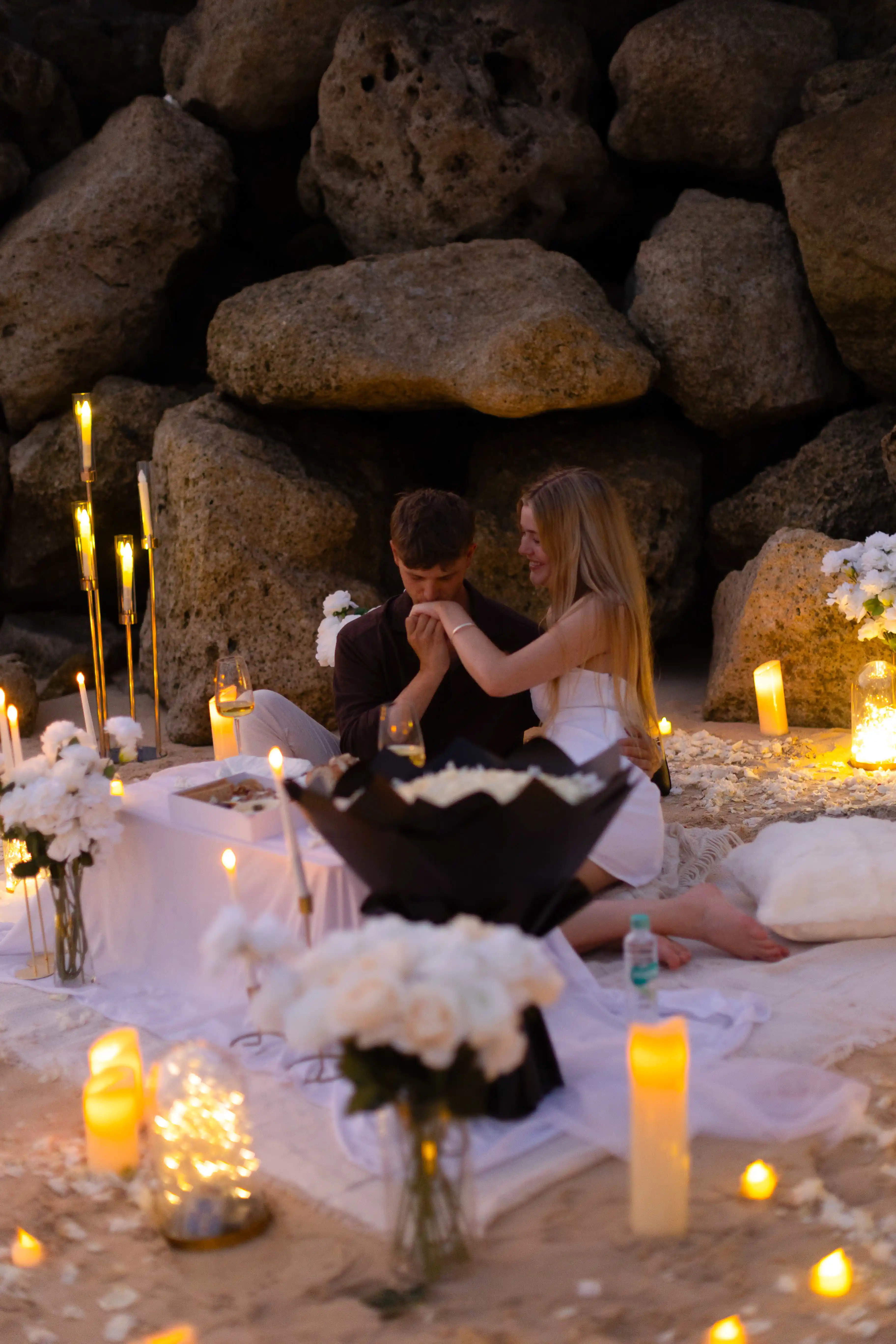 Sunset proposal in Bali with romantic beach atmosphere.