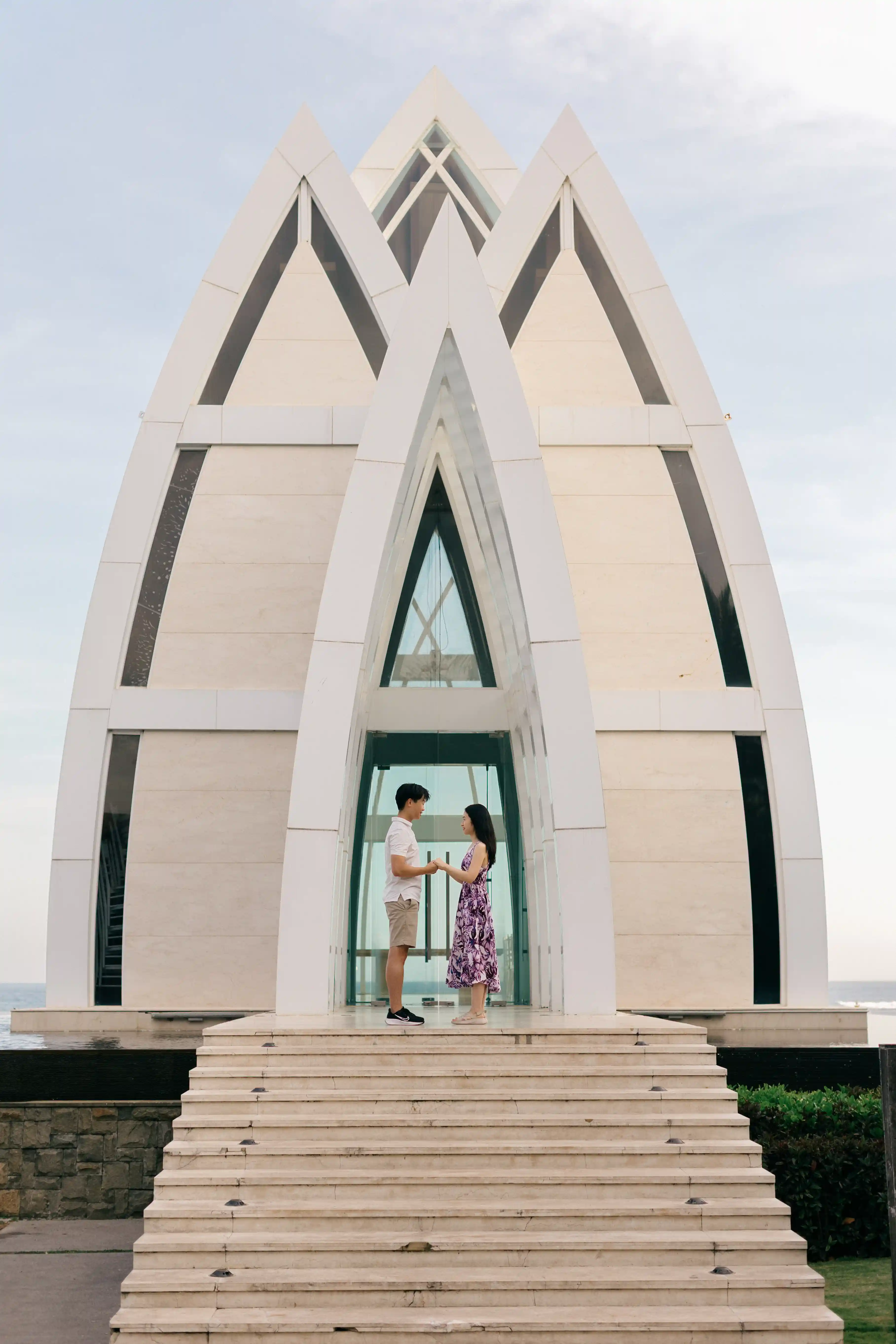 Elegant Bali wedding chapel surrounded by tropical scenery.