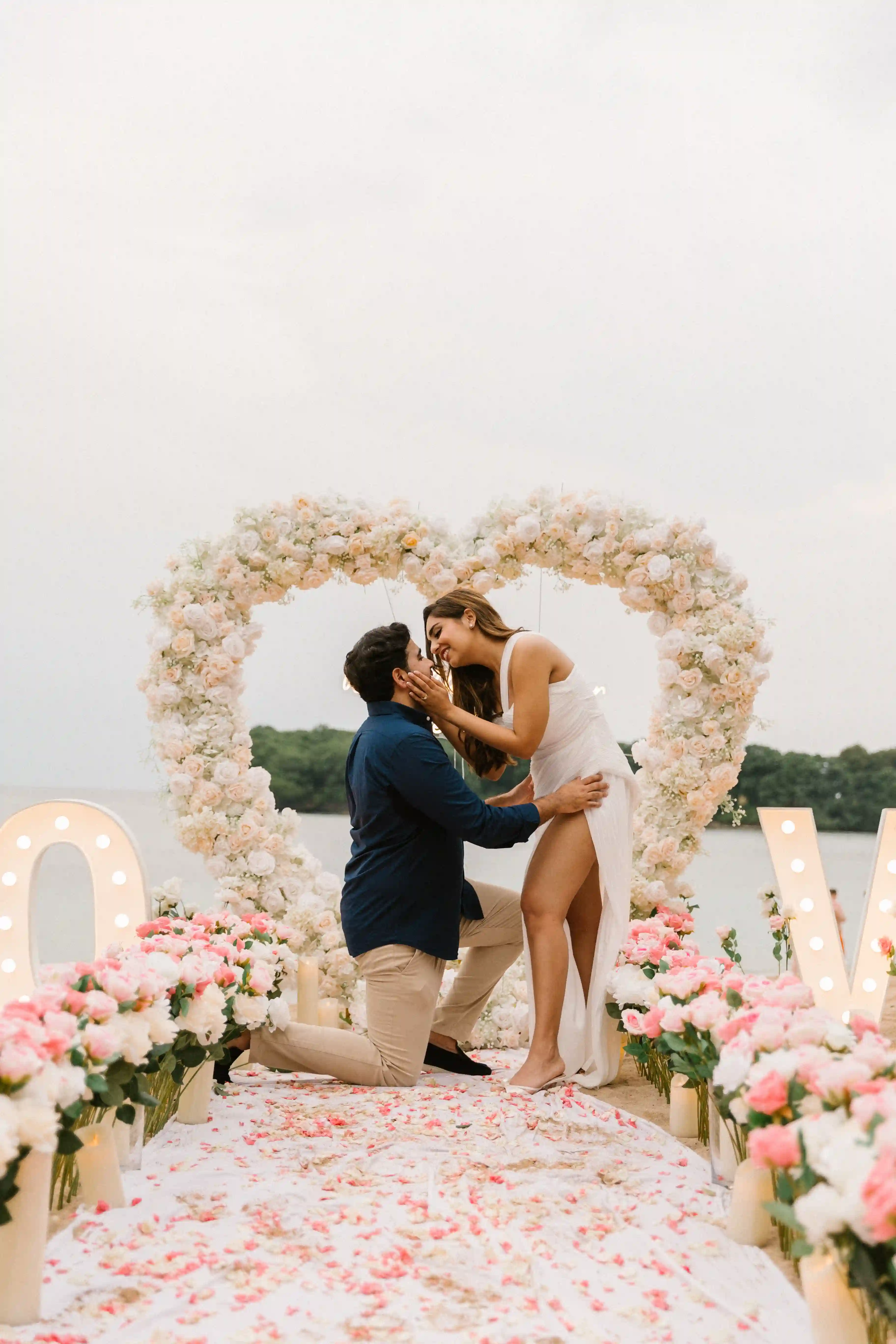 Close-up of luxury engagement bouquet during a romantic beach proposal