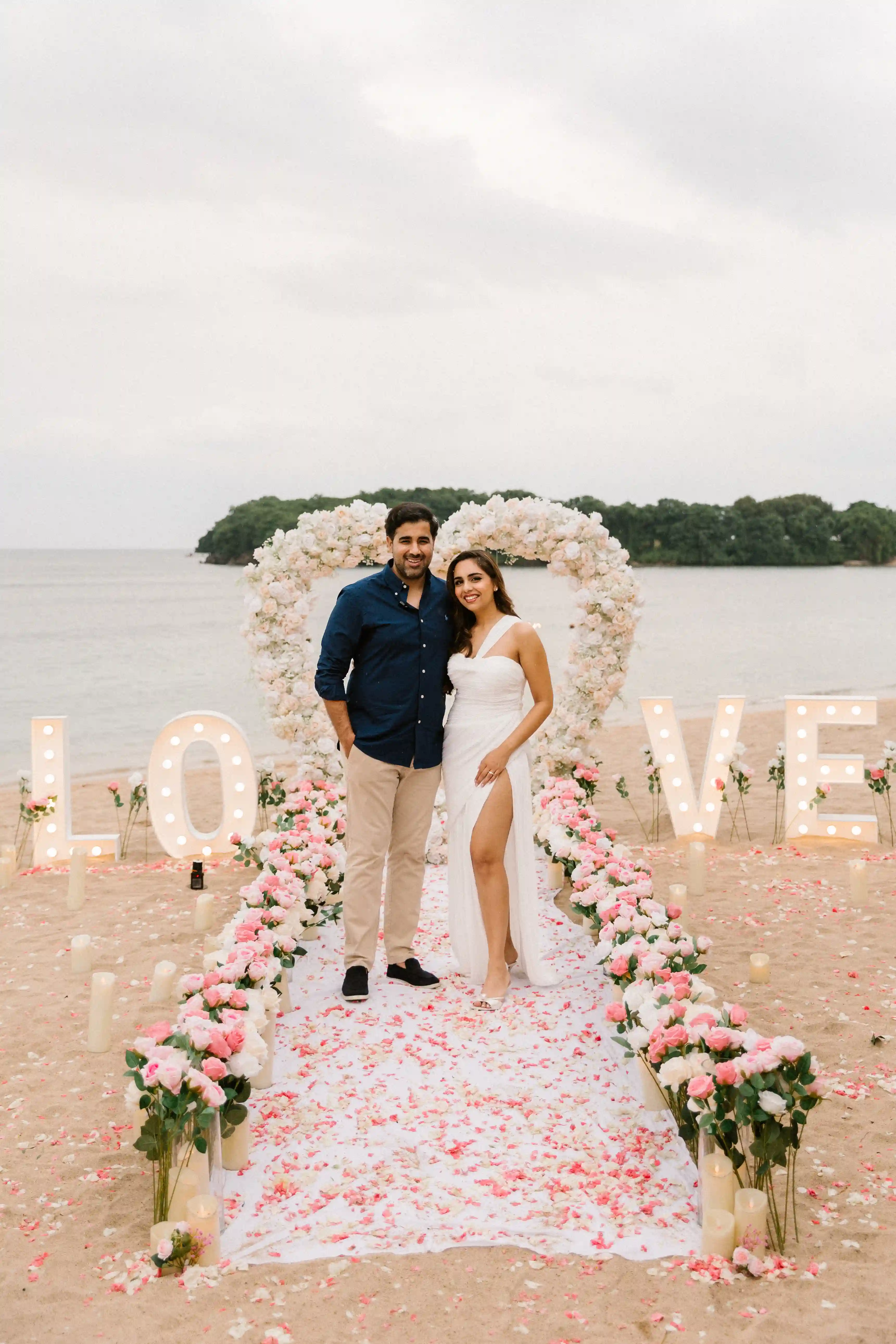 Happy couple after beach engagement