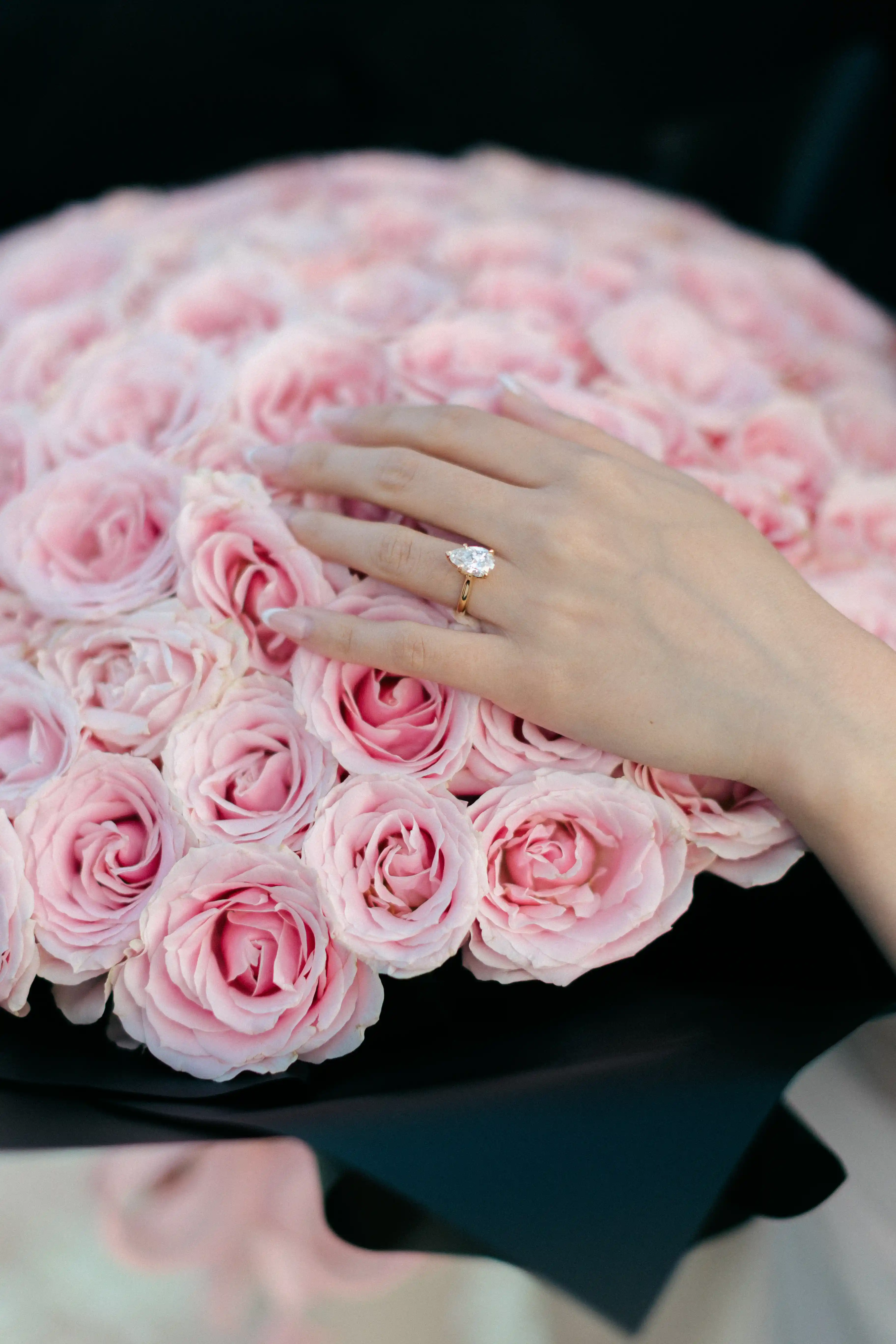 Close-up of pink rose bouquet during engagement in Bali