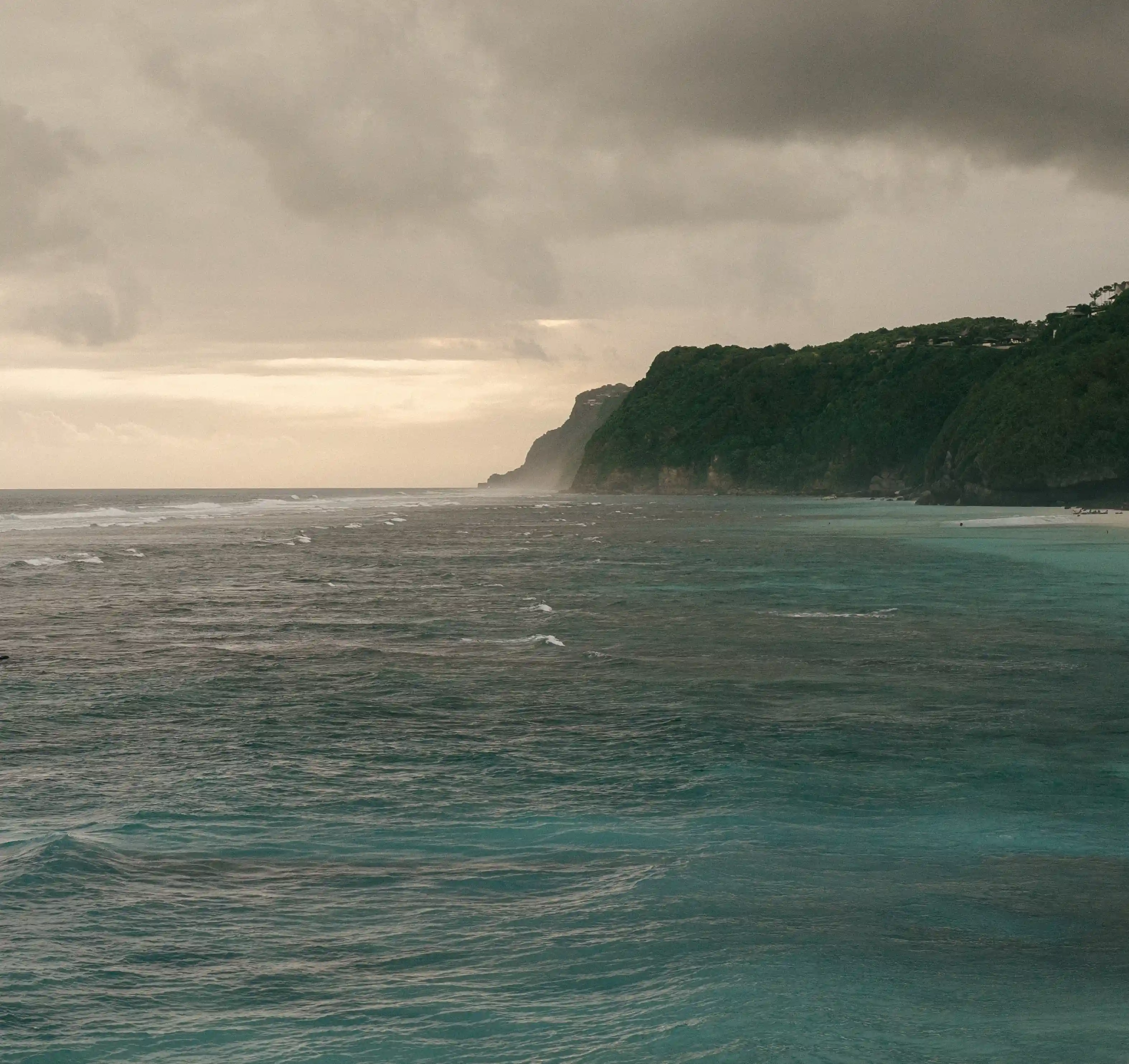 Dramatic ocean cliff view at sunset in Bali proposal location