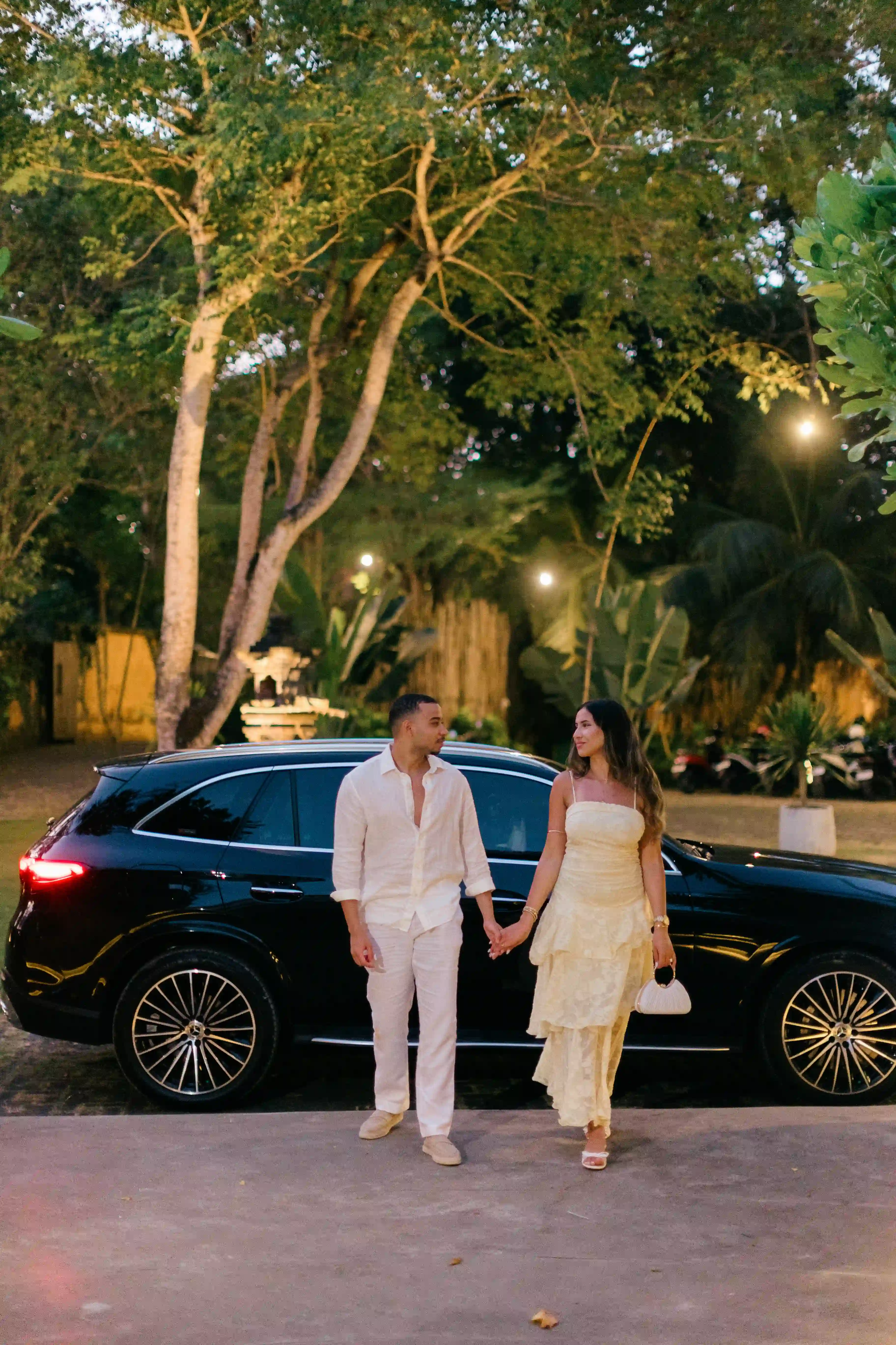 Couple arriving at a private cliff proposal in Bali