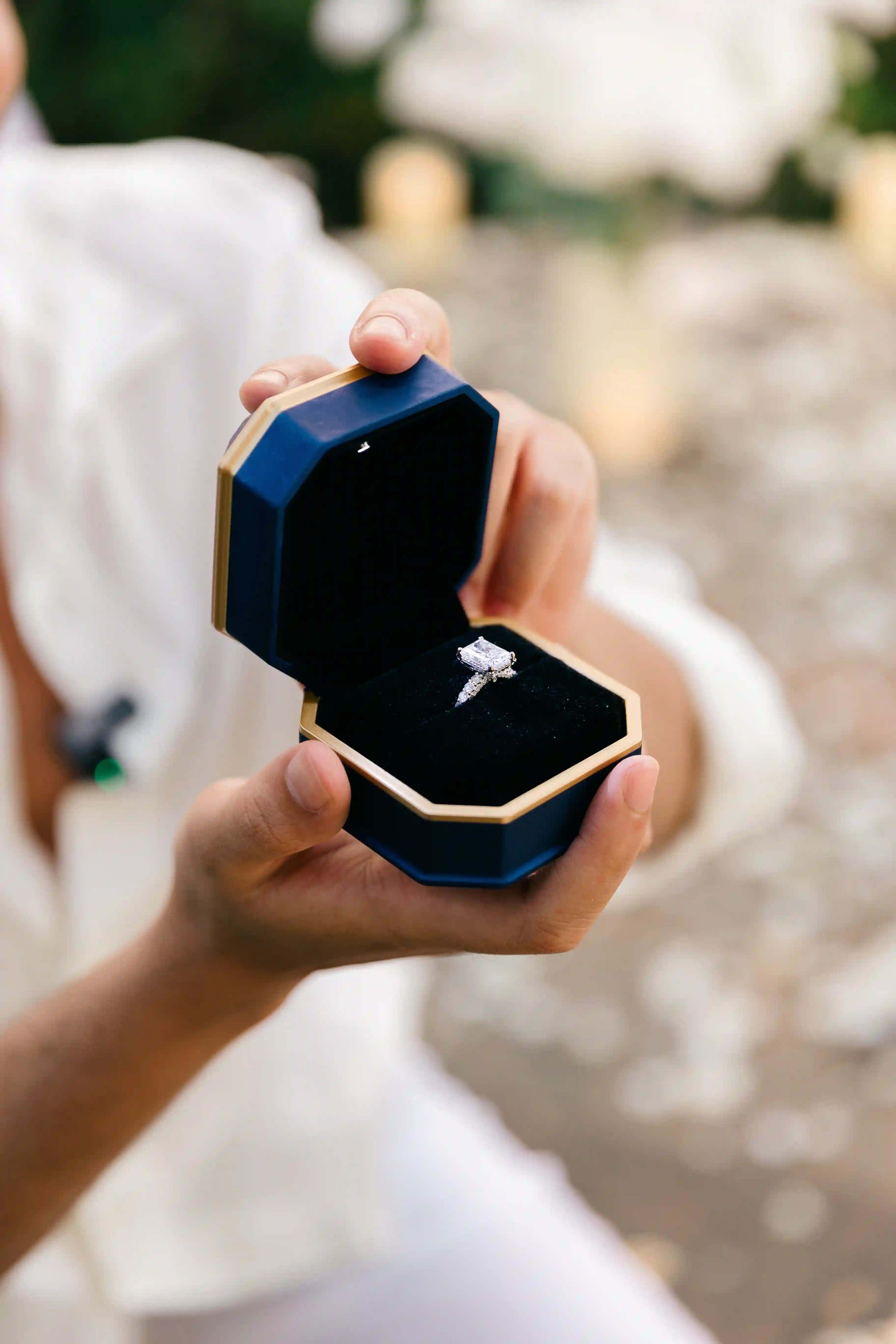 Open ring box at a romantic cliff proposal in Bali