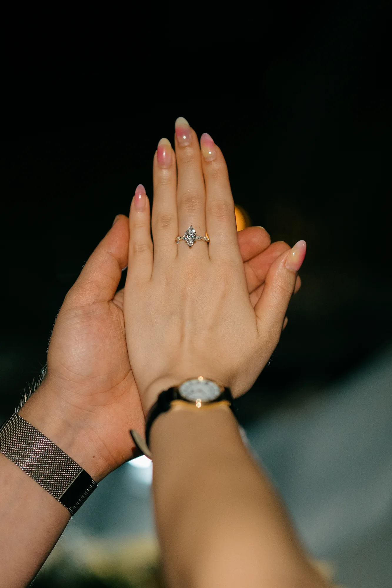 Close-up of a hand showing the engagement ring after a Bali beach proposal