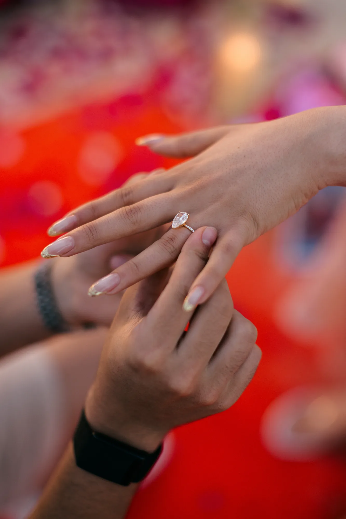 Close up of an engagement ring at a Bali beach firework proposal