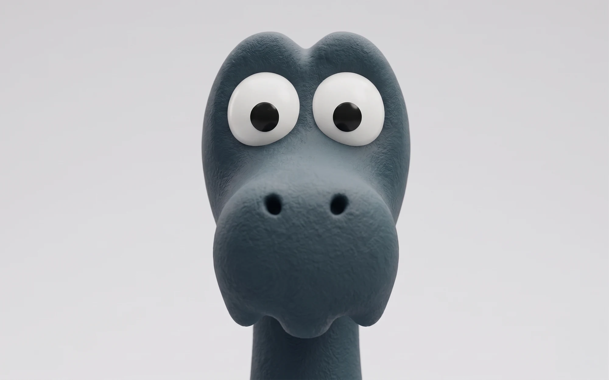 Lost Nessie face close-up with wide googly eyes, blue-gray character study.