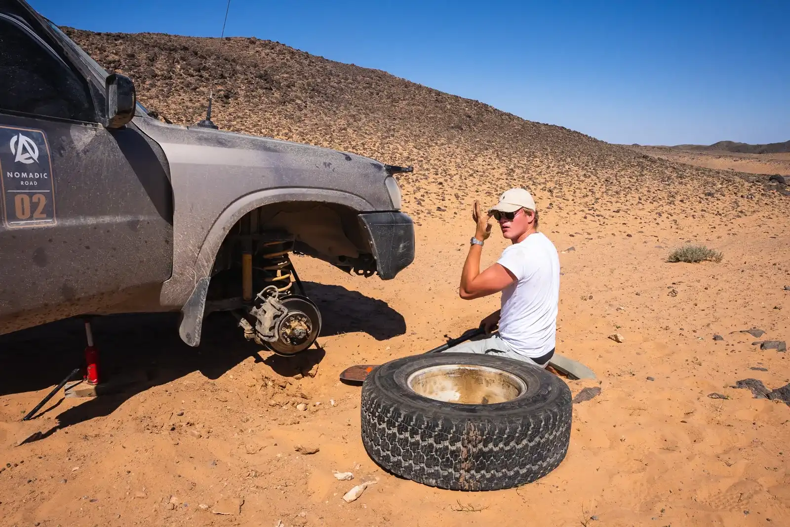 Fixing a puncture in the middle of the desert